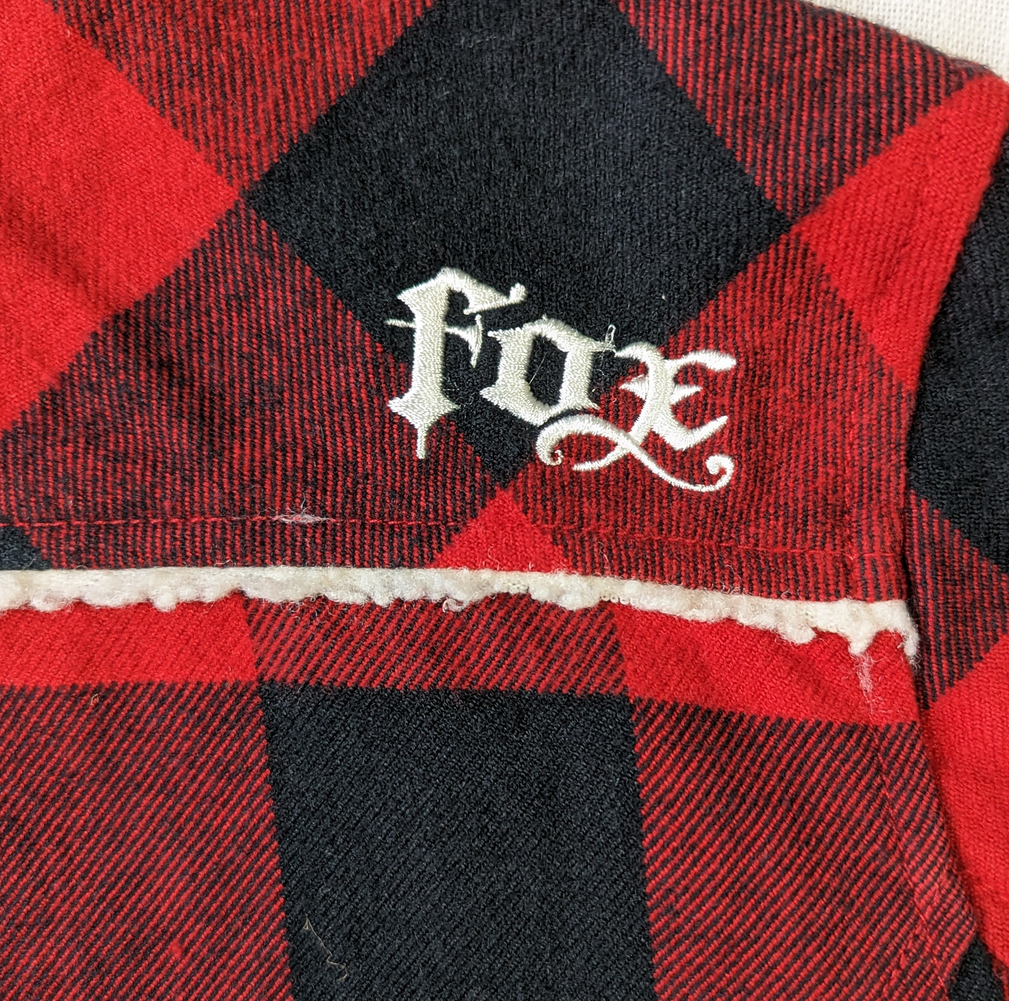 Fox Girls Black and Red Plaid Jacket Size Medium   Rock the streets in style with the Fox Girls Black and Red Plaid Jacket. This medium-sized jacket features a faux