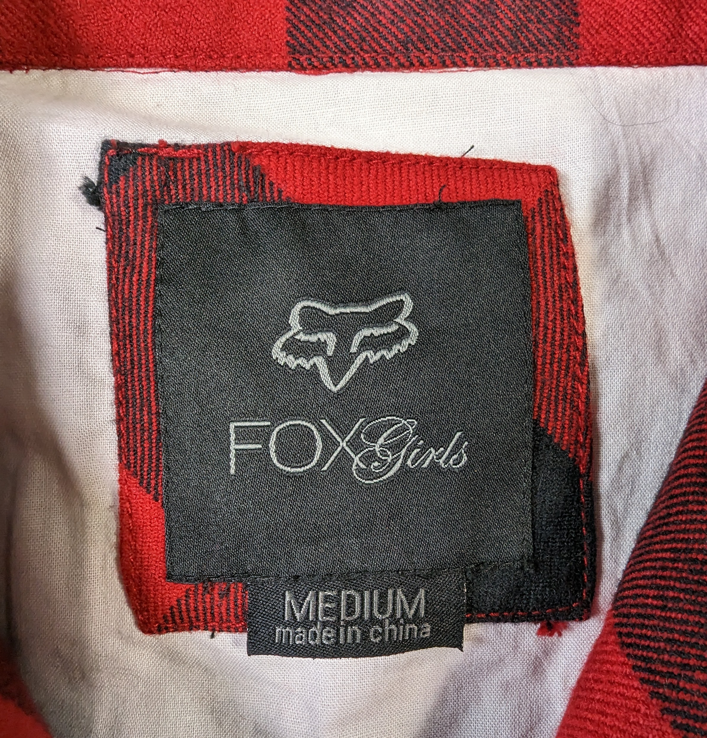 Fox Girls Black and Red Plaid Jacket Size Medium   Rock the streets in style with the Fox Girls Black and Red Plaid Jacket. This medium-sized jacket features a faux