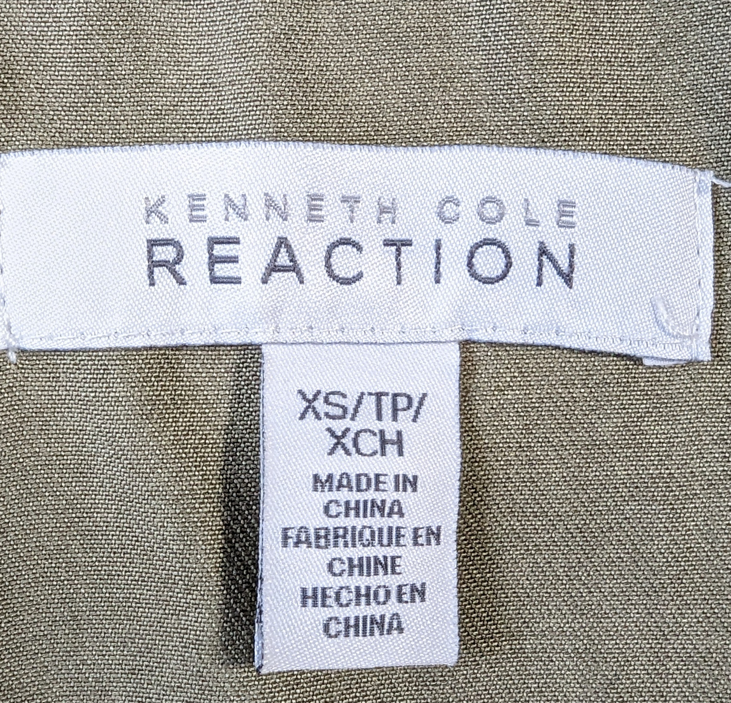 Kenneth Cole Reaction Utility VestYou will have a place for everything with this great vest from Kenneth Cole.  It has lots of pockets and a zip-up, snap front and a hood!  It also has a drawstring w