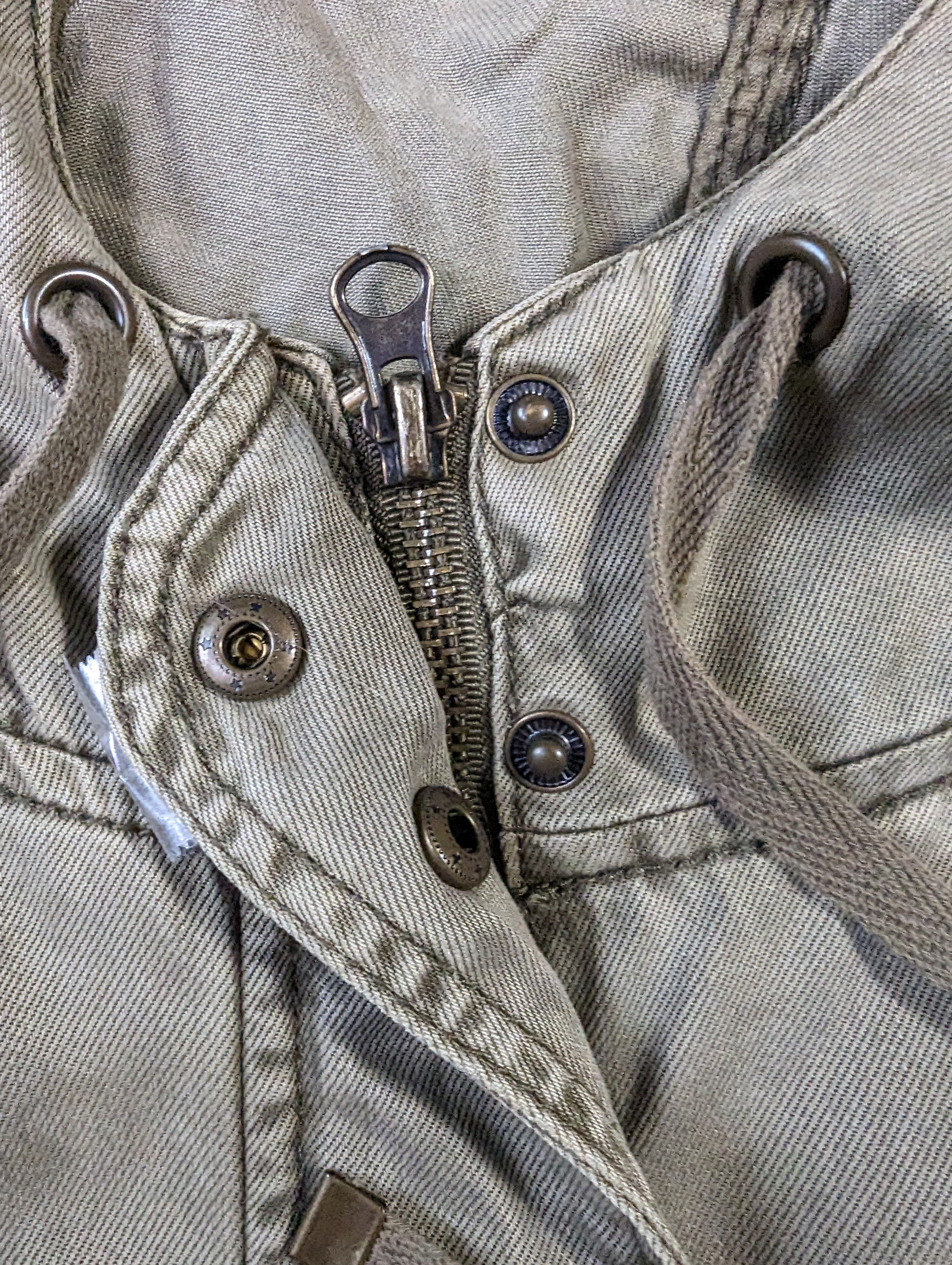 Kenneth Cole Reaction Utility VestYou will have a place for everything with this great vest from Kenneth Cole.  It has lots of pockets and a zip-up, snap front and a hood!  It also has a drawstring w