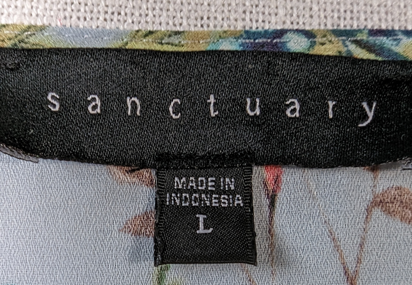 Sanctuary Button-up Floral BlouseThe lovely floral design on this blouse will make it a favorite of yours. You can wear with jeans and sneakers for a casual look, or dress it up with a skirt and he