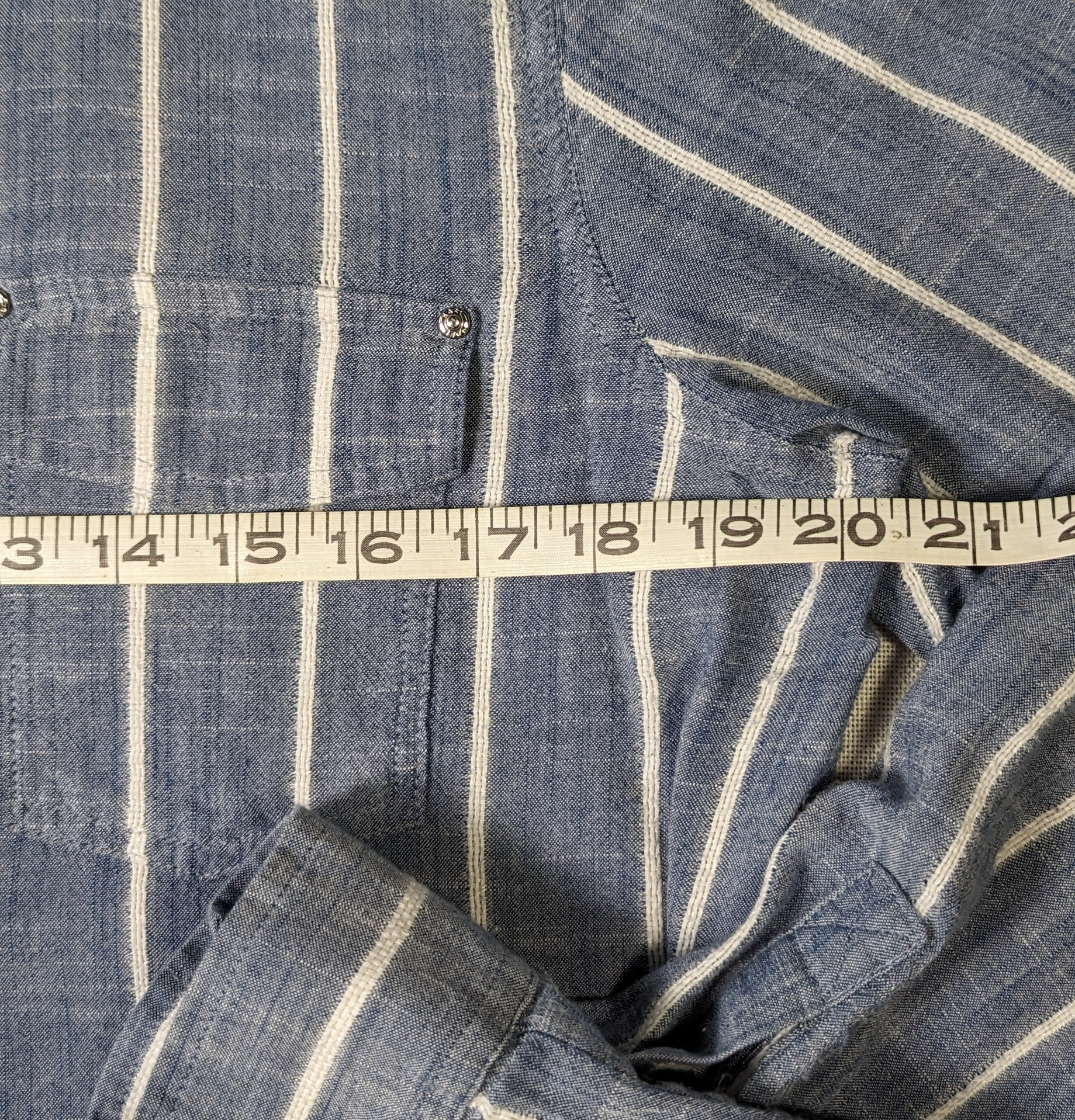 Karl Lagerfeld Paris Striped ShirtA classic style you can wear day or night!  Looks amazing with white pants or with jeans!
Measurement:  armpit to armpit - 20"