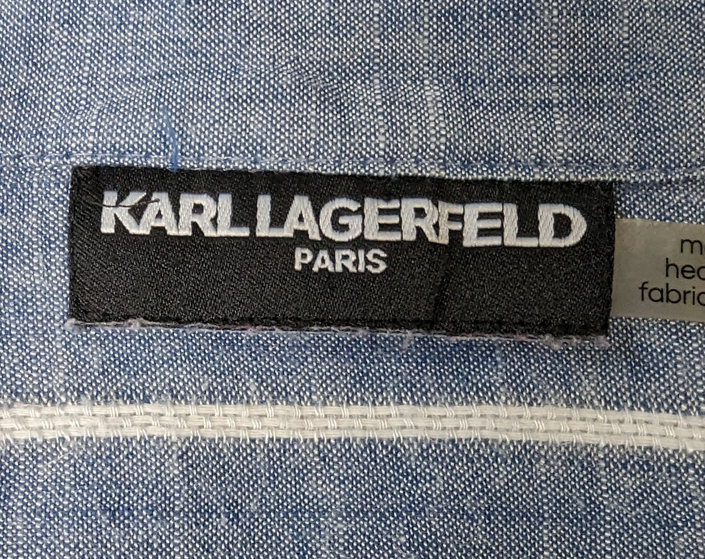 Karl Lagerfeld Paris Striped ShirtA classic style you can wear day or night!  Looks amazing with white pants or with jeans!
Measurement:  armpit to armpit - 20"