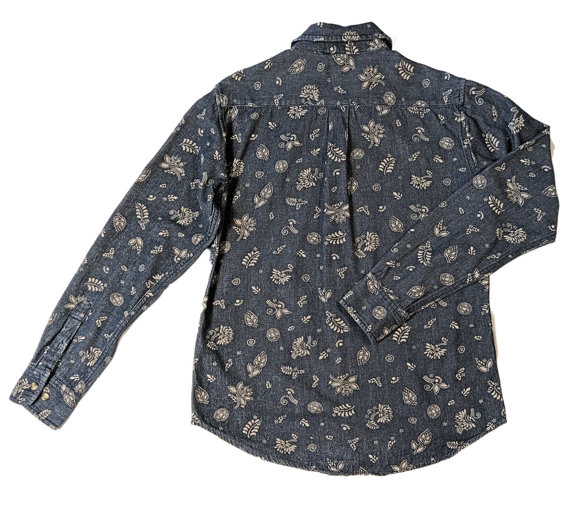 Obey Propaganda Floral Printed Chambray ShirtElevated denim shirt with paisley pattern.  Perfect for a casual day out and about.  Throw on a pair of white sneakers, and you are good to go!