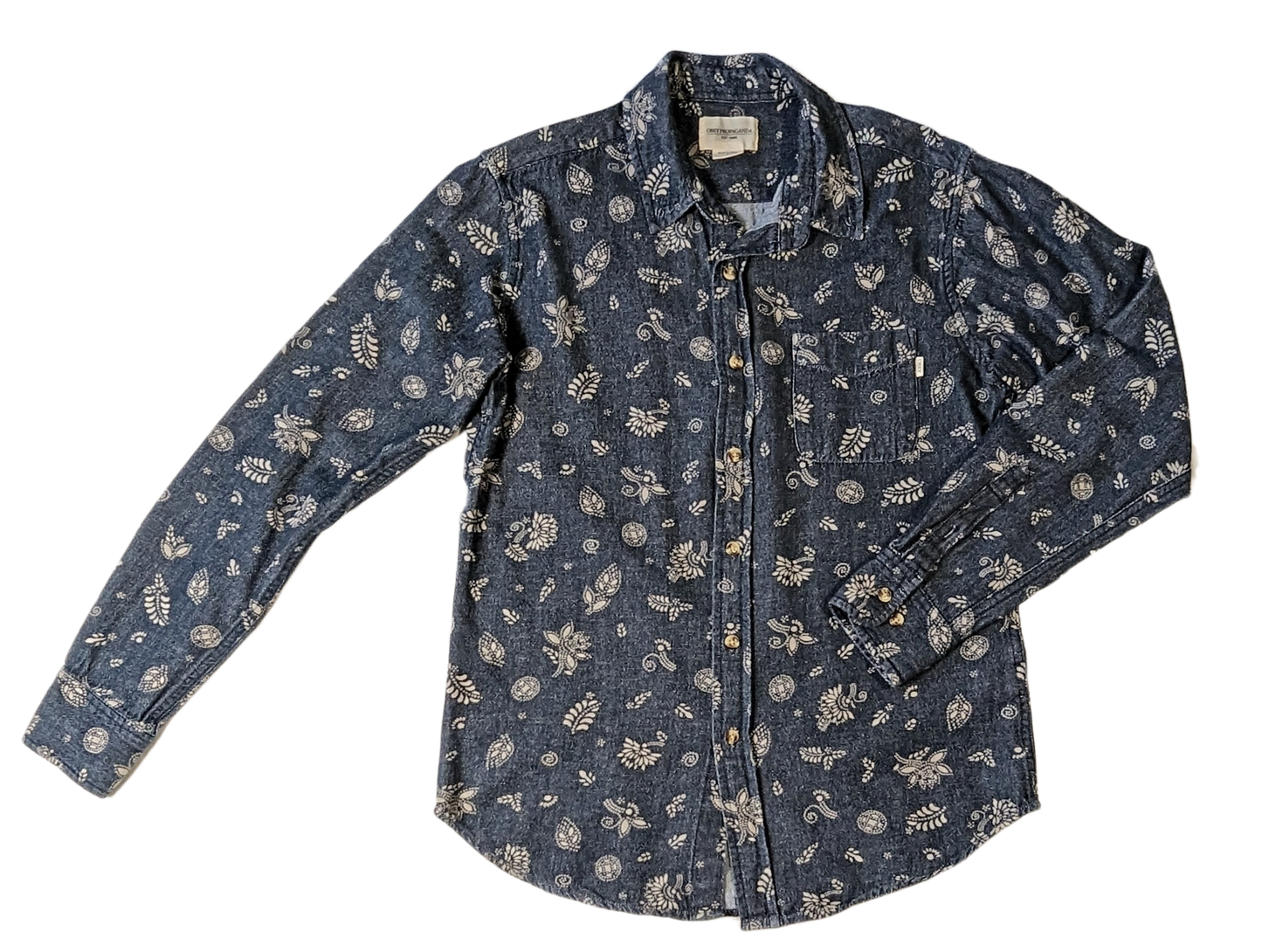 Obey Propaganda Floral Printed Chambray ShirtElevated denim shirt with paisley pattern.  Perfect for a casual day out and about.  Throw on a pair of white sneakers, and you are good to go!
