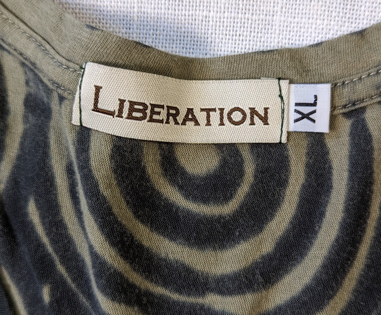 Liberation Short Sleeve T-shirt This shirt is so soft, and it has a great design!  You can wear it with so many things!  And because it is so comfy, you will reach for it all the time!