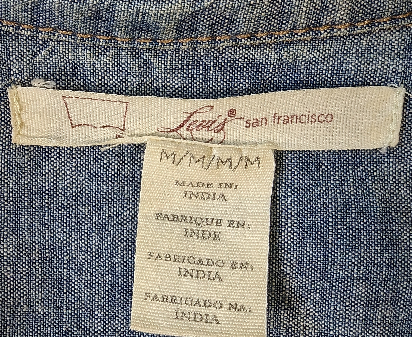 Levi's San Francisco Tunic Length Chambray Shirt A great chambray shirt can go a long way.  Wear it as a shirt, or as a short dress, or as a light-weight jacket!  Great metal buttons down the front add a nice styli