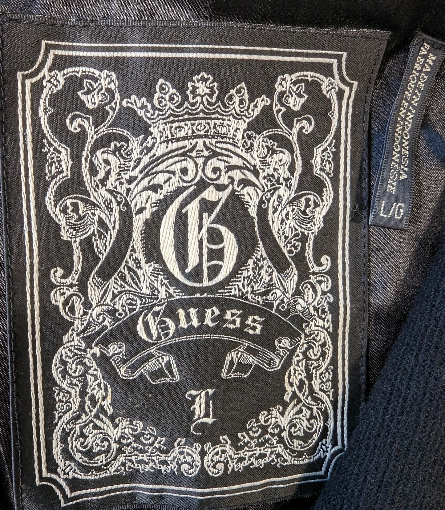 Guess Puffy Sleeve Shawl Collar Black Wool Jacket Size Large  Stay chic and cozy with the Guess Puffy Sleeve Shawl Collar Black Wool Jacket. Featuring a stylish shaw