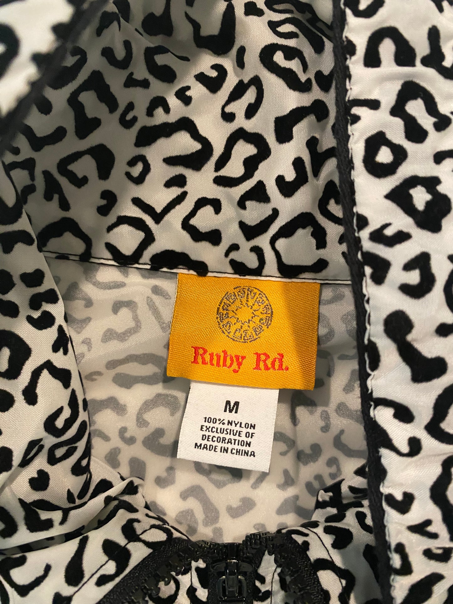 Ruby Red Black & White Leopard Print Windbreaker JacketRuby Red Black & White Leopard Print Windbreaker Jacket Not only is this jacket light weight and very functional, but it has style too! Look fantastic while keep