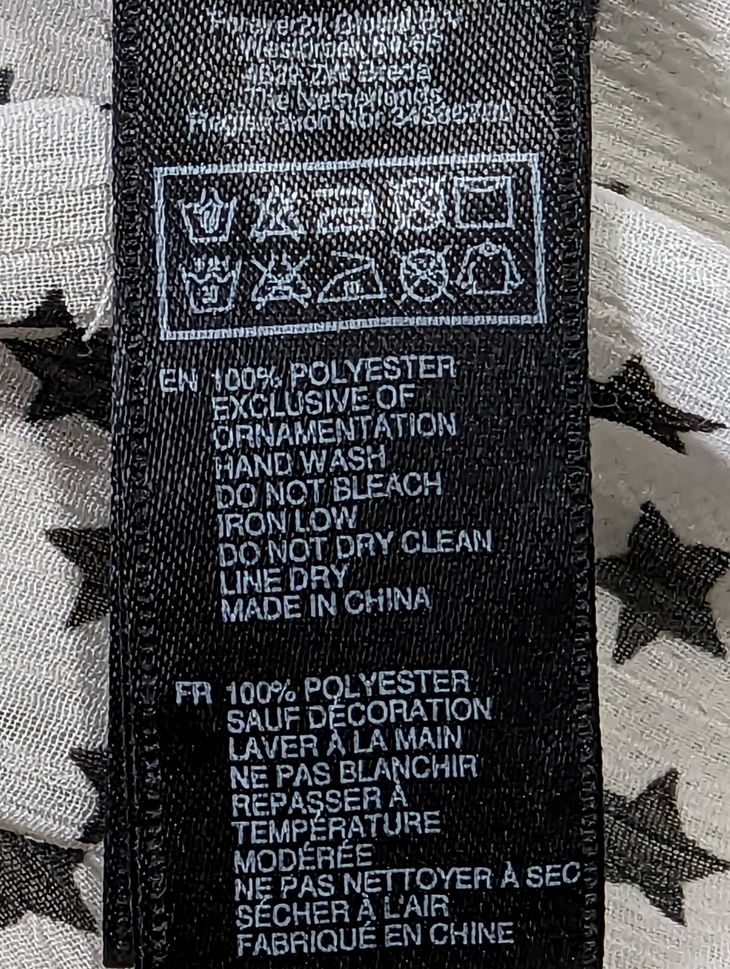 XXI Sheer Star Print BlouseThis is a great blouse to add a little interest in your outfit.  The star print is so fun!  You can wear it with jeans and sneakers, or dress it up with a black skir