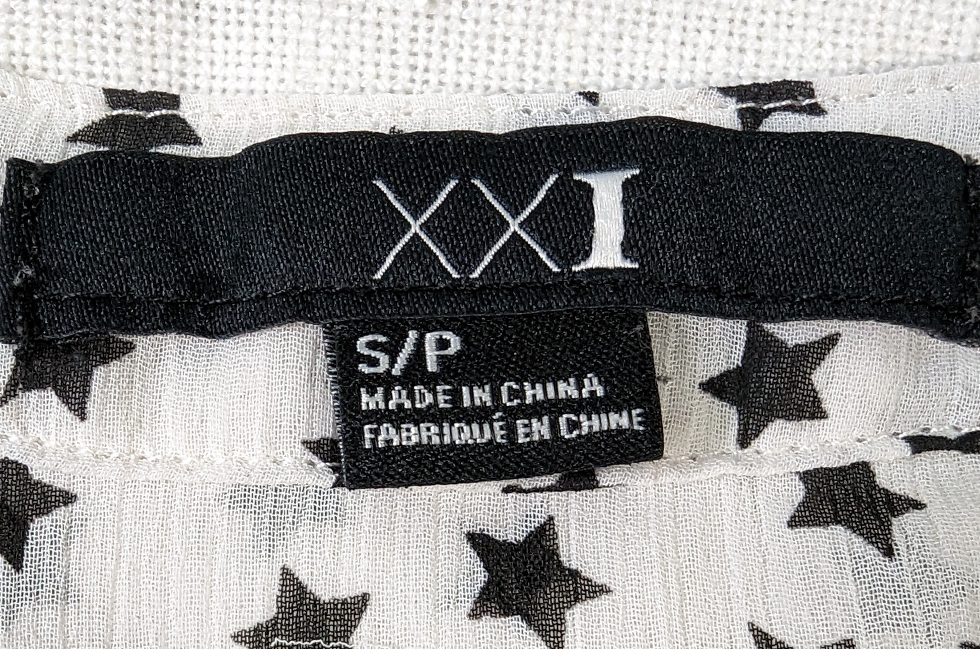 XXI Sheer Star Print BlouseThis is a great blouse to add a little interest in your outfit.  The star print is so fun!  You can wear it with jeans and sneakers, or dress it up with a black skir