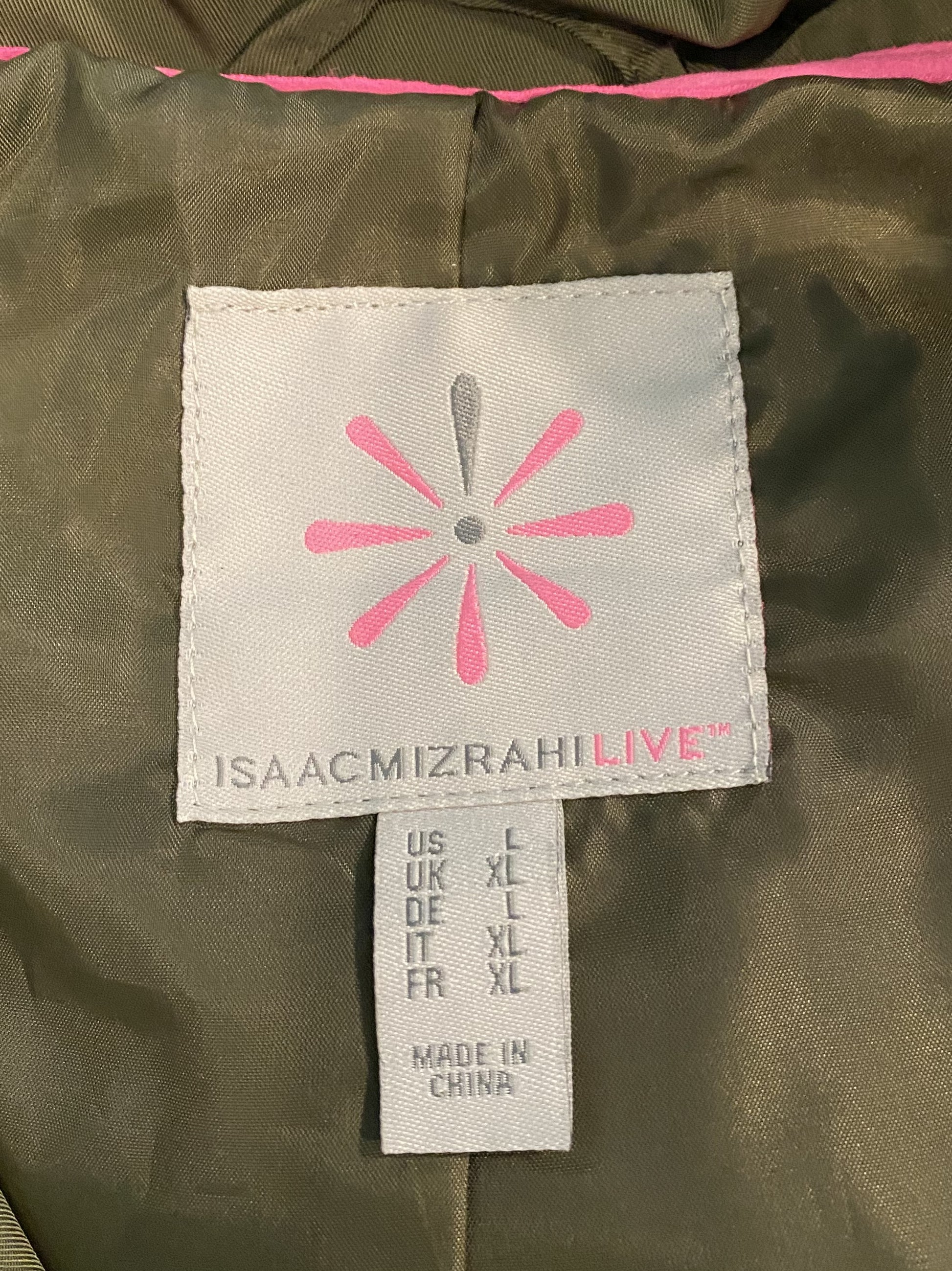 Isaac Mizrahi Live! Women's SOHO Hooded Olive Green Rain Jacket This rain jacket has such great styling. Along with a hood and pockets, it zips & snaps up the front to ensure keeping the chill out.