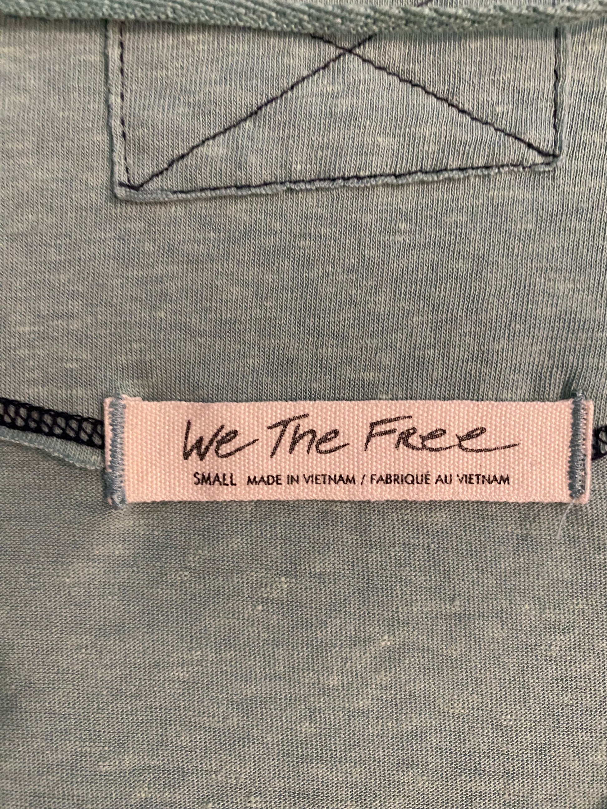 We the Free Two Tone V-Neck 3/4 Sleeve T-Shirt Cute and comfy! This elevated basic tee is great for everyday casual wear.