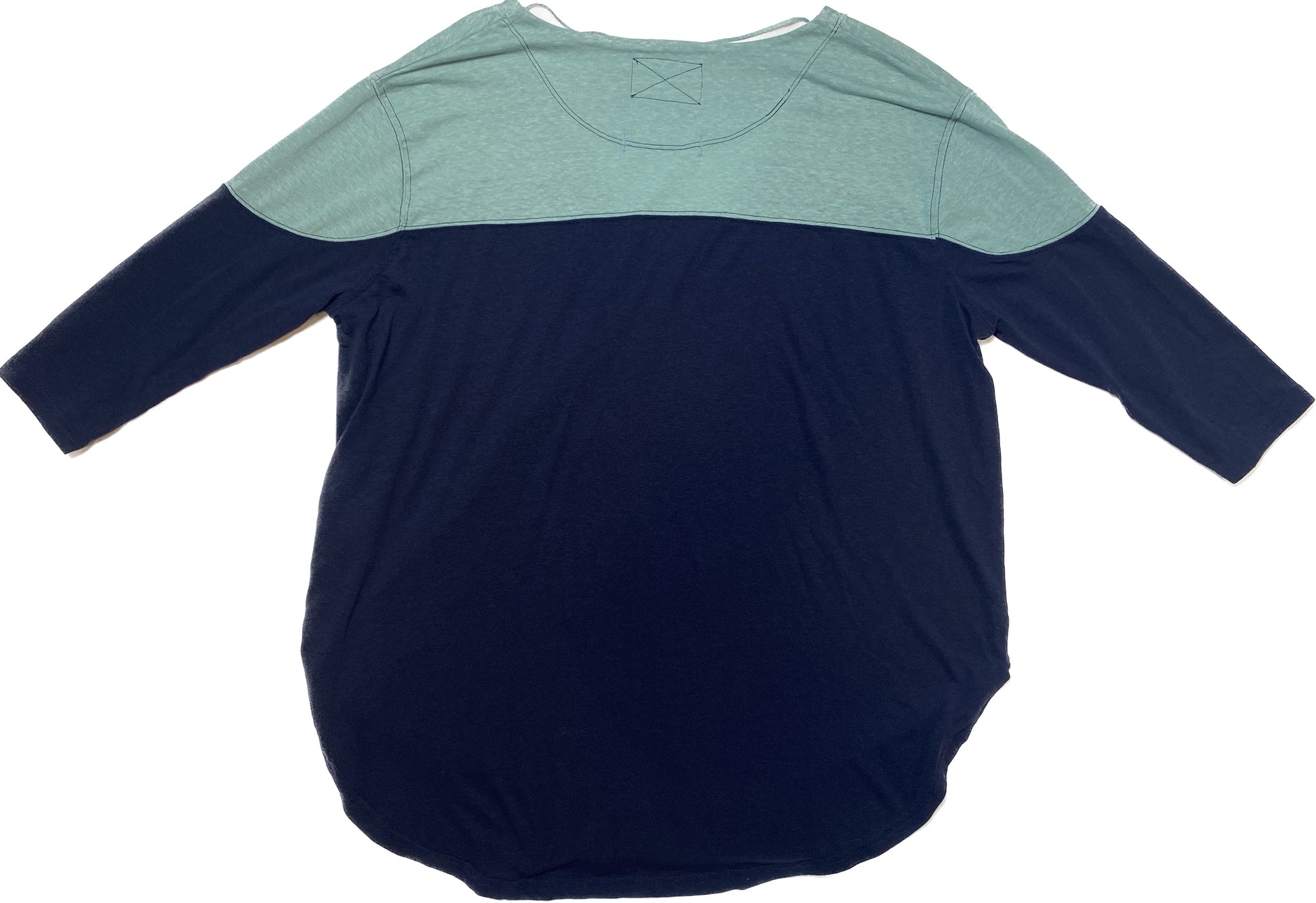 We the Free Two Tone V-Neck 3/4 Sleeve T-Shirt Cute and comfy! This elevated basic tee is great for everyday casual wear.