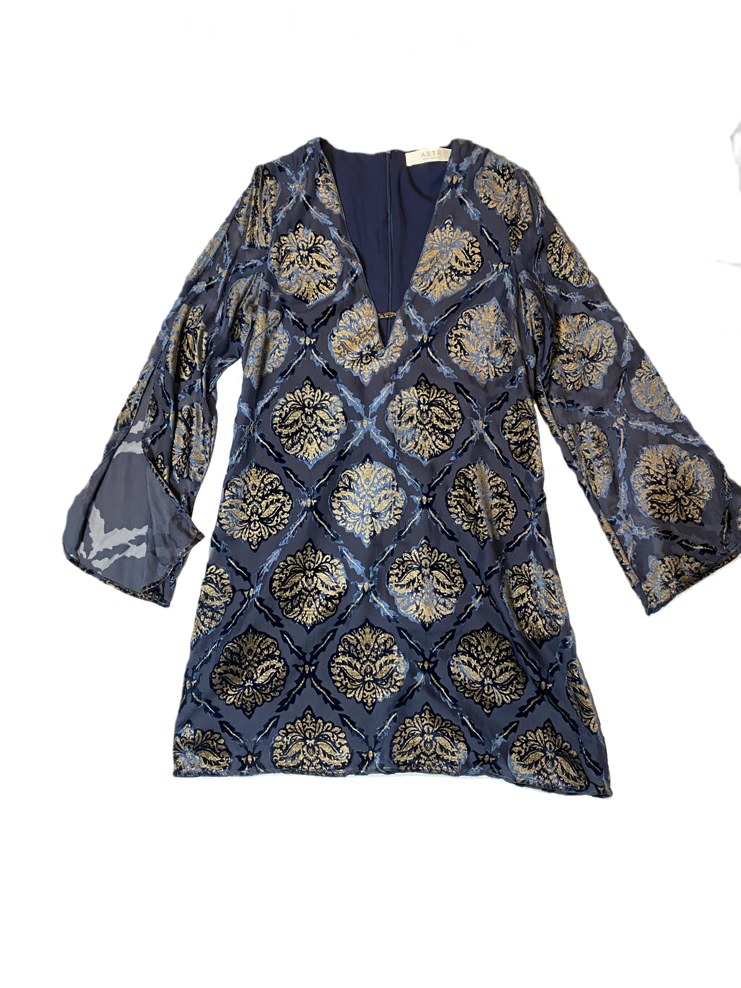 ASTR Blue & Gold Velvet Burn-out Tunic DressThis delicate blue with gold velvet bun-out dress has a V-neck with long sleeves with slits.
Wear dressed up with heels, or dressed down with knee highs and chunky l