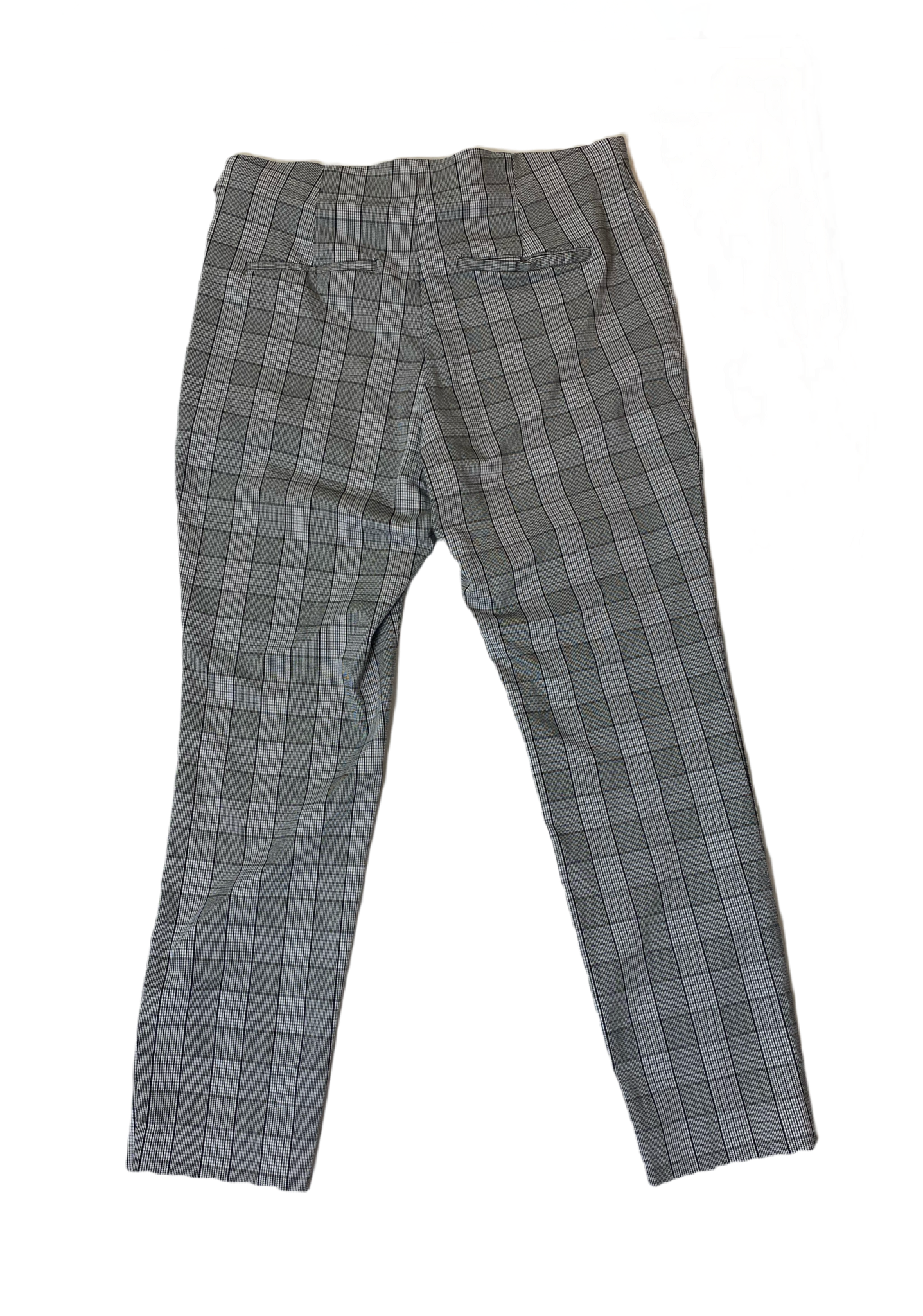 A New Day Plaid Skinny Ankle Pant Black, white & grey plaid side zip elastic waist skinny ankle pants.
Pair these pants with boots and a denim jacket, or chunky heels and a blouse.