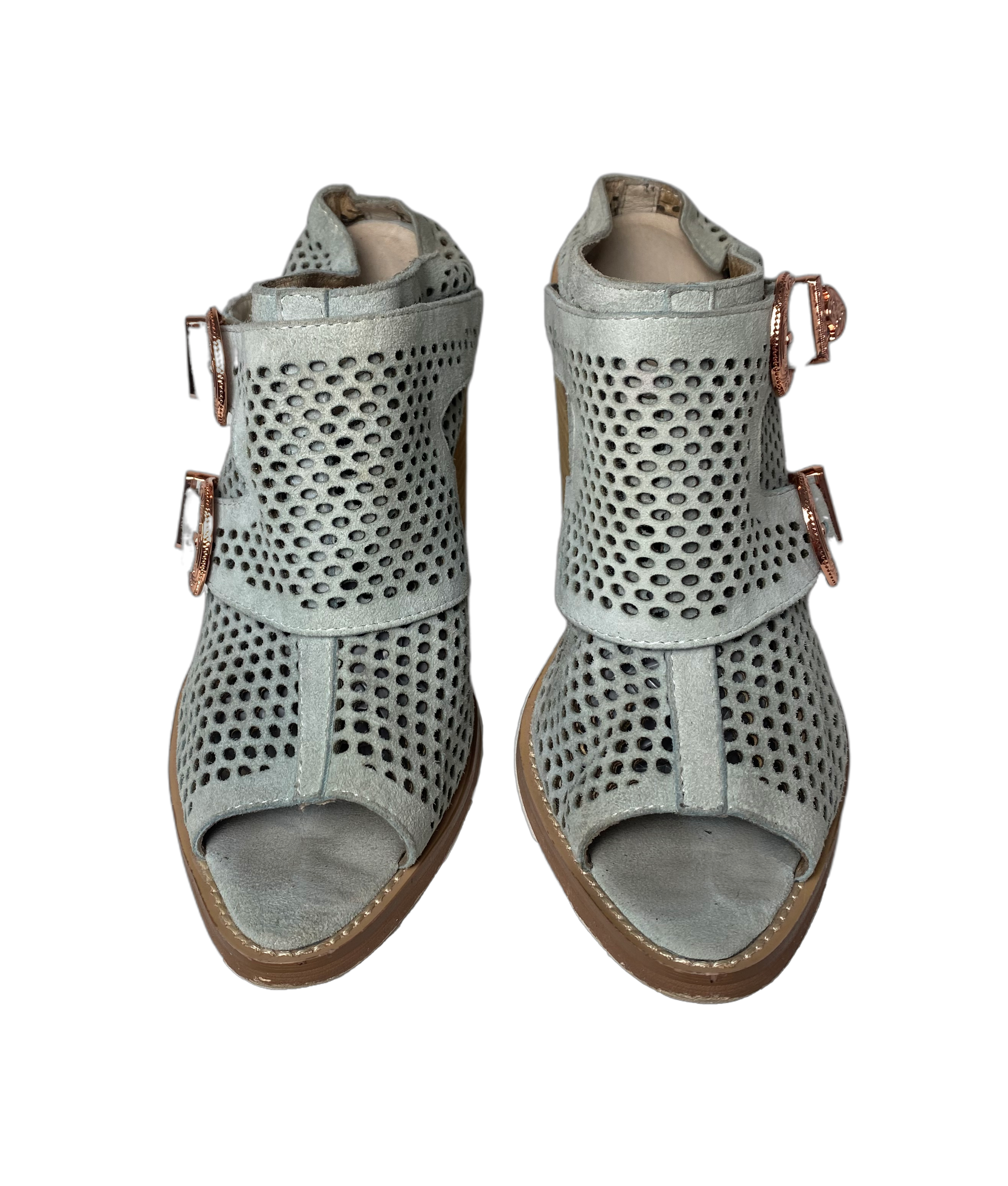 Nightwalker Blind Perforated Suede Peep Toe Mule - Limited EditionAdd a little western flare with these great suede mules. Pair with jeans or a maxi skirt and denim jacket for an elevated casual look.
