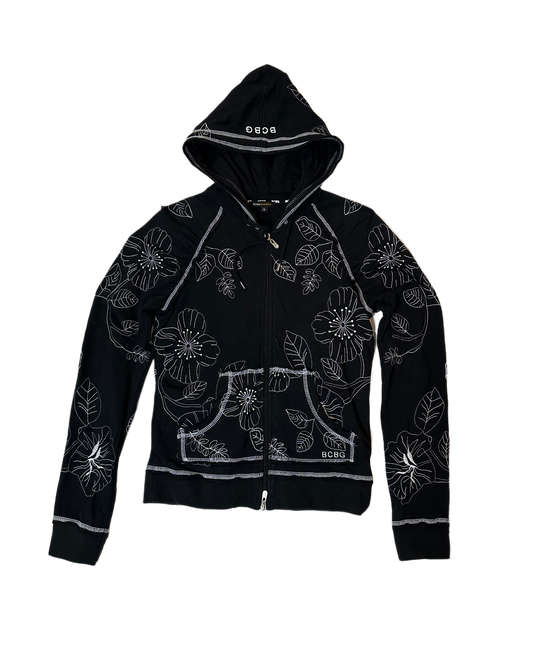 BCBGeneration Black Zip-Up Hoodie with White StitchingSlip into something cozy and chic! The BCBGeneration Black Zip-Up Hoodie with White Stitching is the perfect addition to your wardrobe, combining go-to style with a BCBGeneration Black Zip-Hoodie