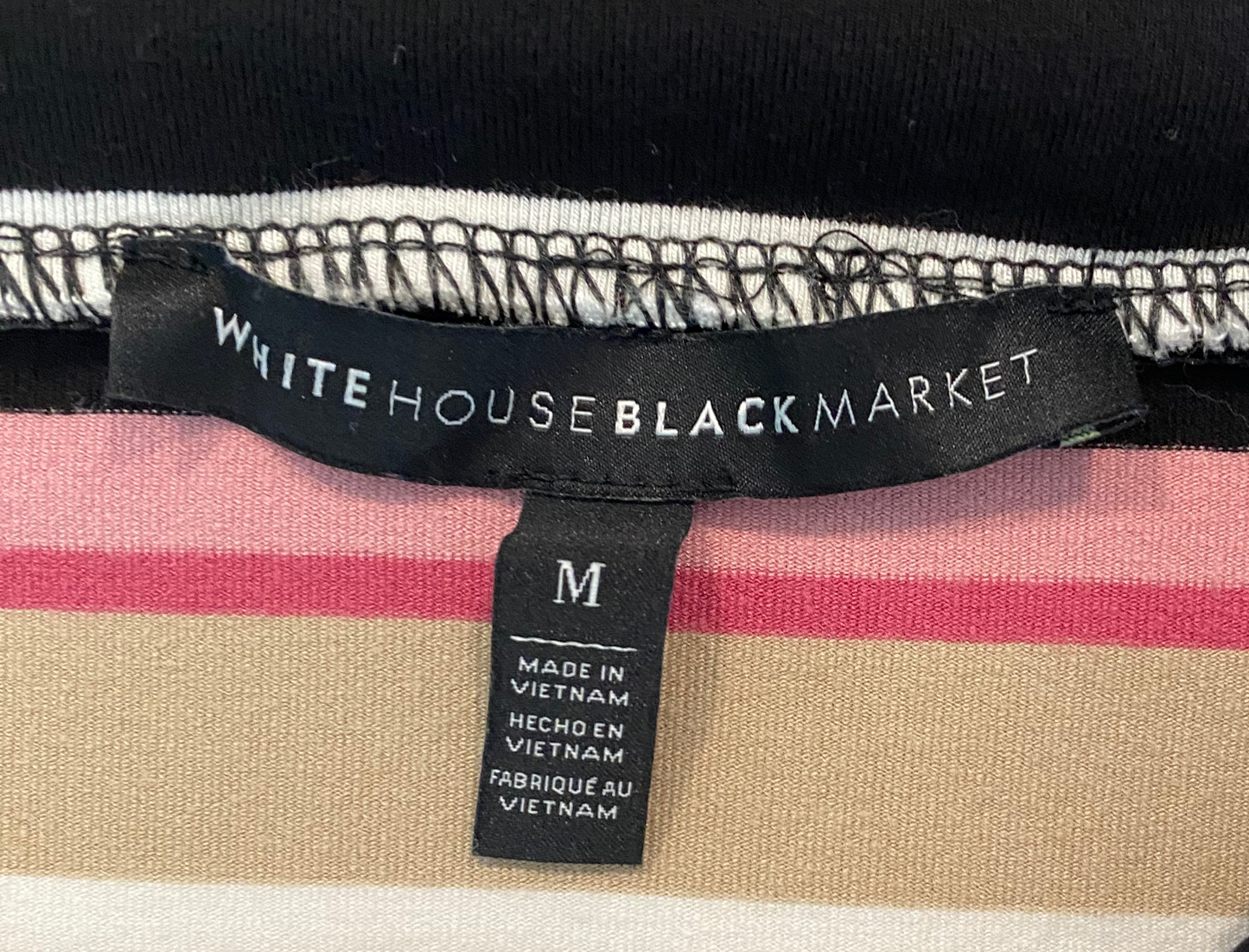 White House Black Market Stripped Skirt DressWhat a great idea! This skirt doubles as a dress!! Just unfold the waist band and whala, you have a sleeveless dress.