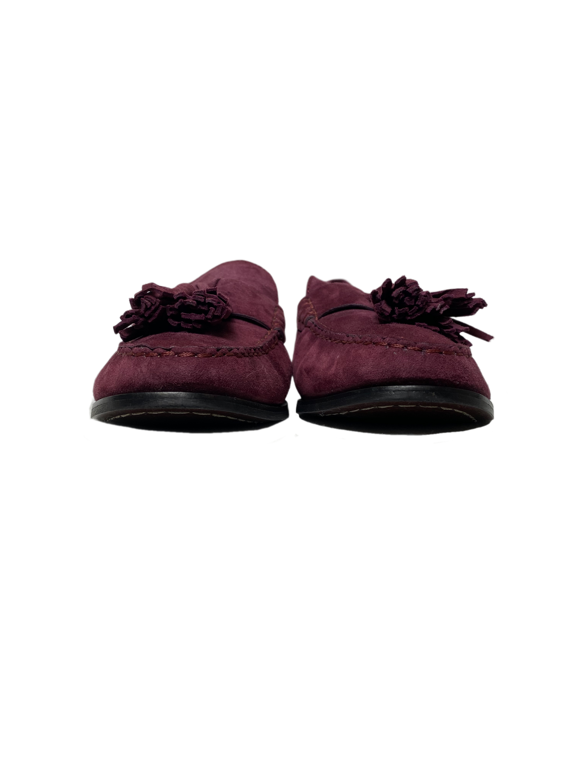 Cole Haan Plum Faux Suede Slip-On Tassel LoafersOn trend plum faux suede tassel loafers. So cute and easy to wear.
Wear these to work with black slacks, and on the go with jeans.