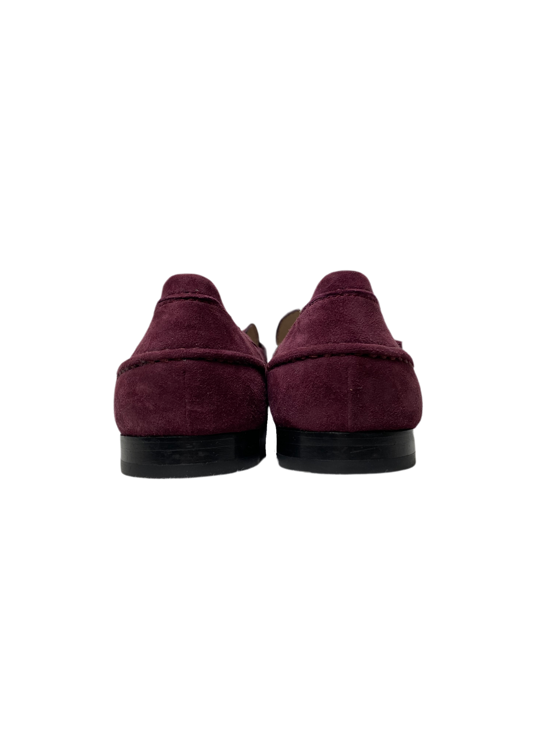 Cole Haan Plum Faux Suede Slip-On Tassel LoafersOn trend plum faux suede tassel loafers. So cute and easy to wear.
Wear these to work with black slacks, and on the go with jeans.