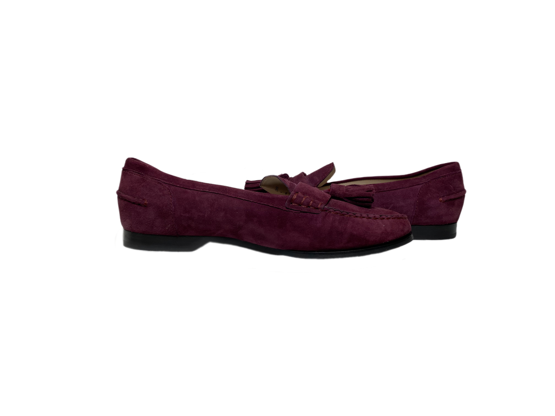 Cole Haan Plum Faux Suede Slip-On Tassel LoafersOn trend plum faux suede tassel loafers. So cute and easy to wear.
Wear these to work with black slacks, and on the go with jeans.