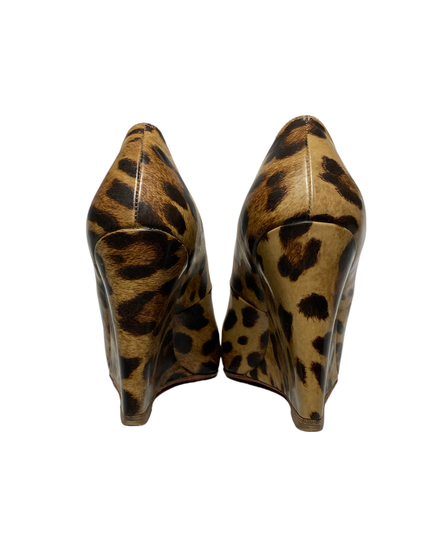 These Christian Louboutin Leopard Print Patent Leather Wedges are worn, but still look amazing!! The bottom shows most of the wear. Box and cloth bag included.
The i