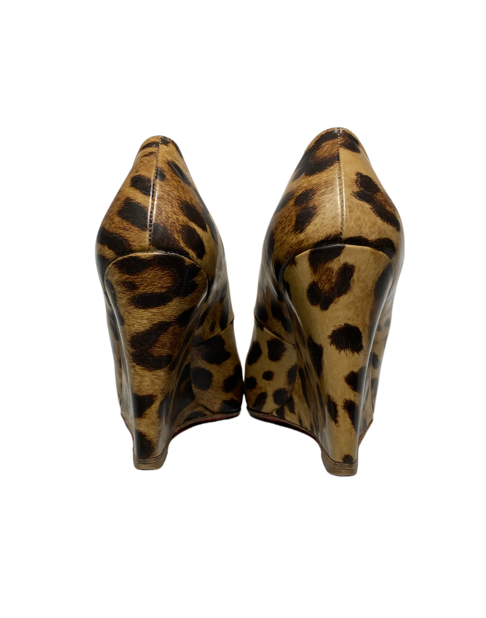 These Christian Louboutin Leopard Print Patent Leather Wedges are worn, but still look amazing!! The bottom shows most of the wear. Box and cloth bag included.
The i