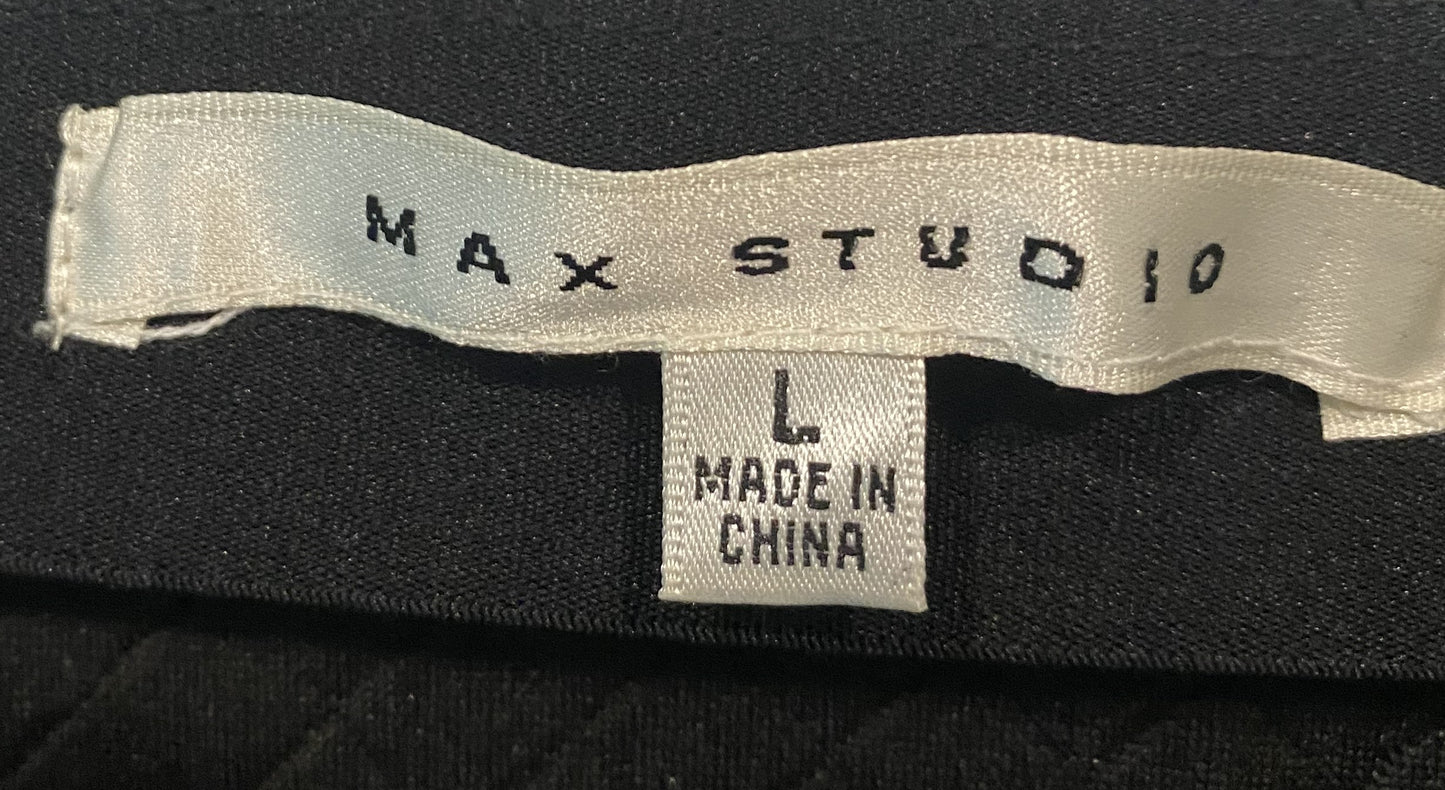 Max Studio Faux Leather Textured Short SkirtPull-on "woven" look faux leather short skirt. Fantastic looking on trend skirt to wear this season.
So easy to wear to work with flats and a cute sweater, then chan
