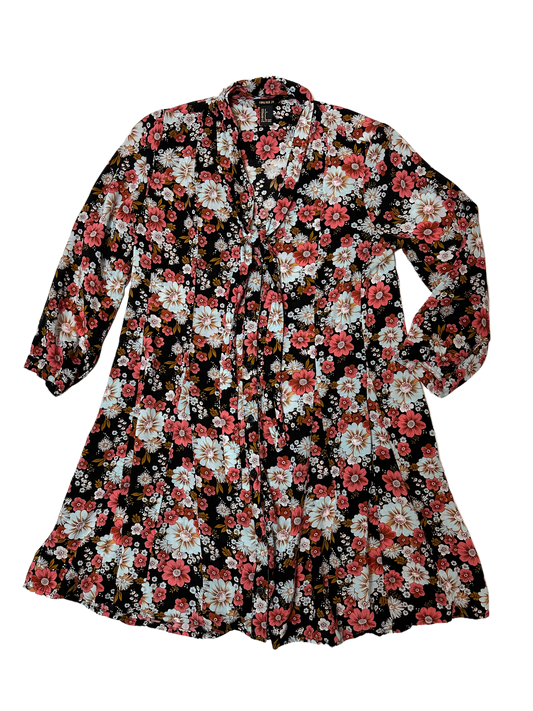 Forever 21 Black Floral Long Tunic with Tie at NeckWear this pretty floral tunic with leggings and sandals for a brunch date, or toss on heels for a night at the movies.Forever 21 Black Floral Long TunicShirt