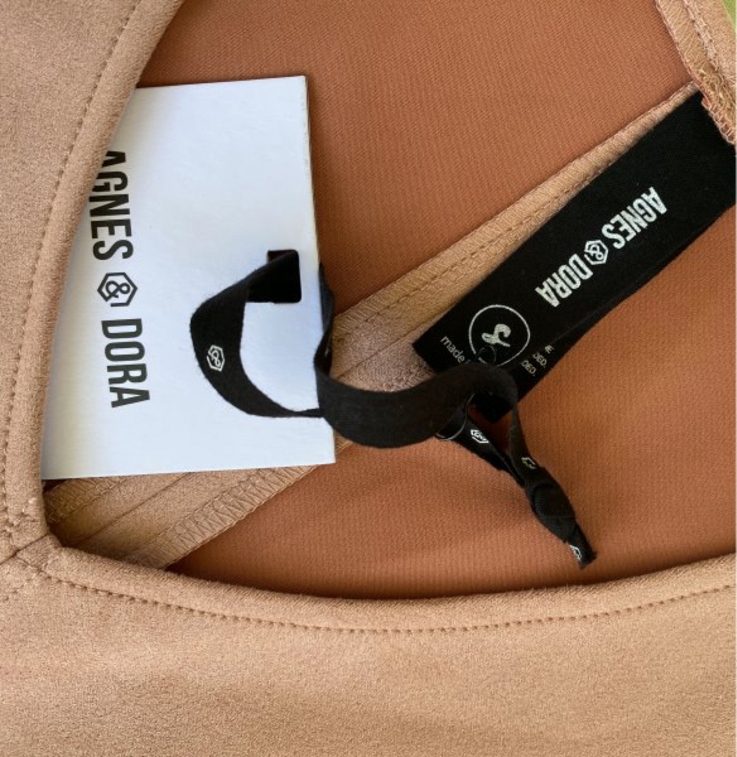 Agnes & Dora Peach Faux Suede dress - NWTEmbrace your playful side with this NWT Agnes & Dora Peach Faux Suede dress. The faux suede material adds a touch of luxury while the fit and flare design accent