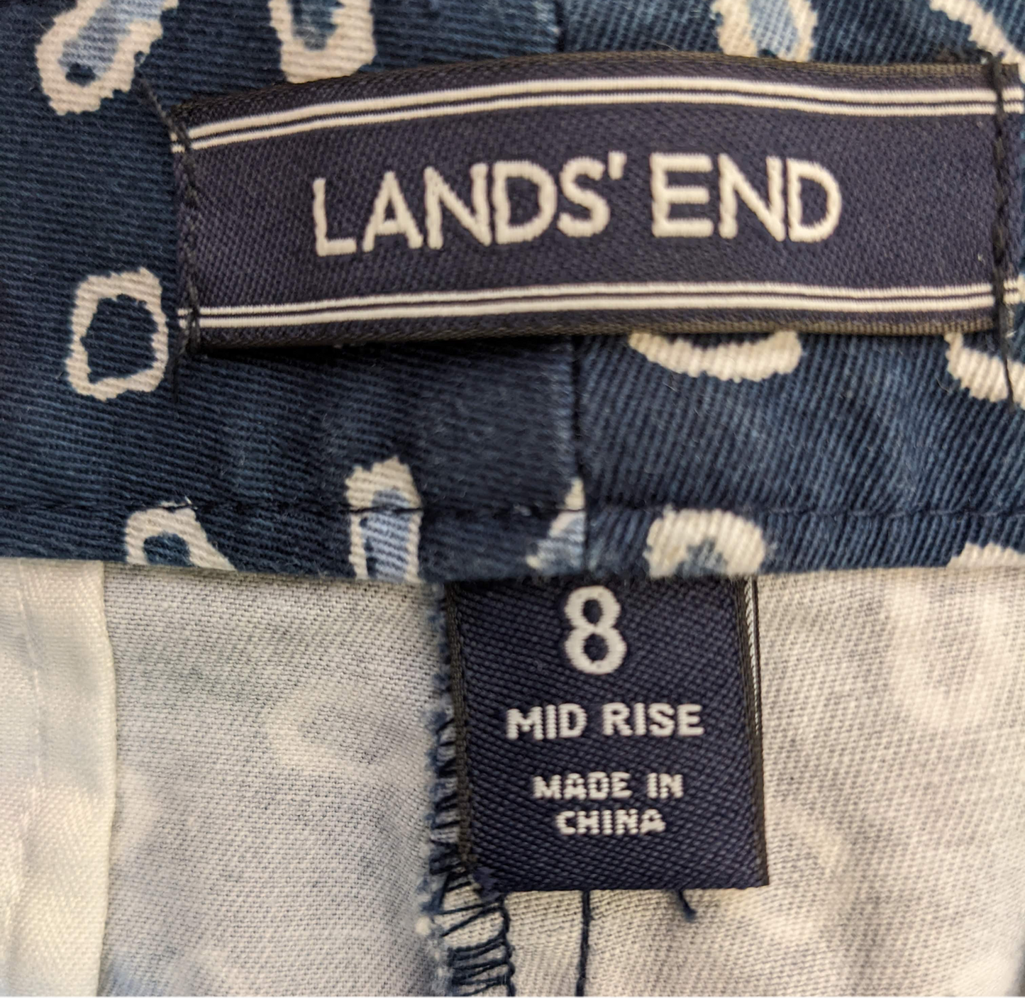 Lands' End Printed Shorts Size 8  Brighten up your summer wardrobe with Lands' End Printed Shorts! These playful blue shorts feature a touch of Spandex for a comfort