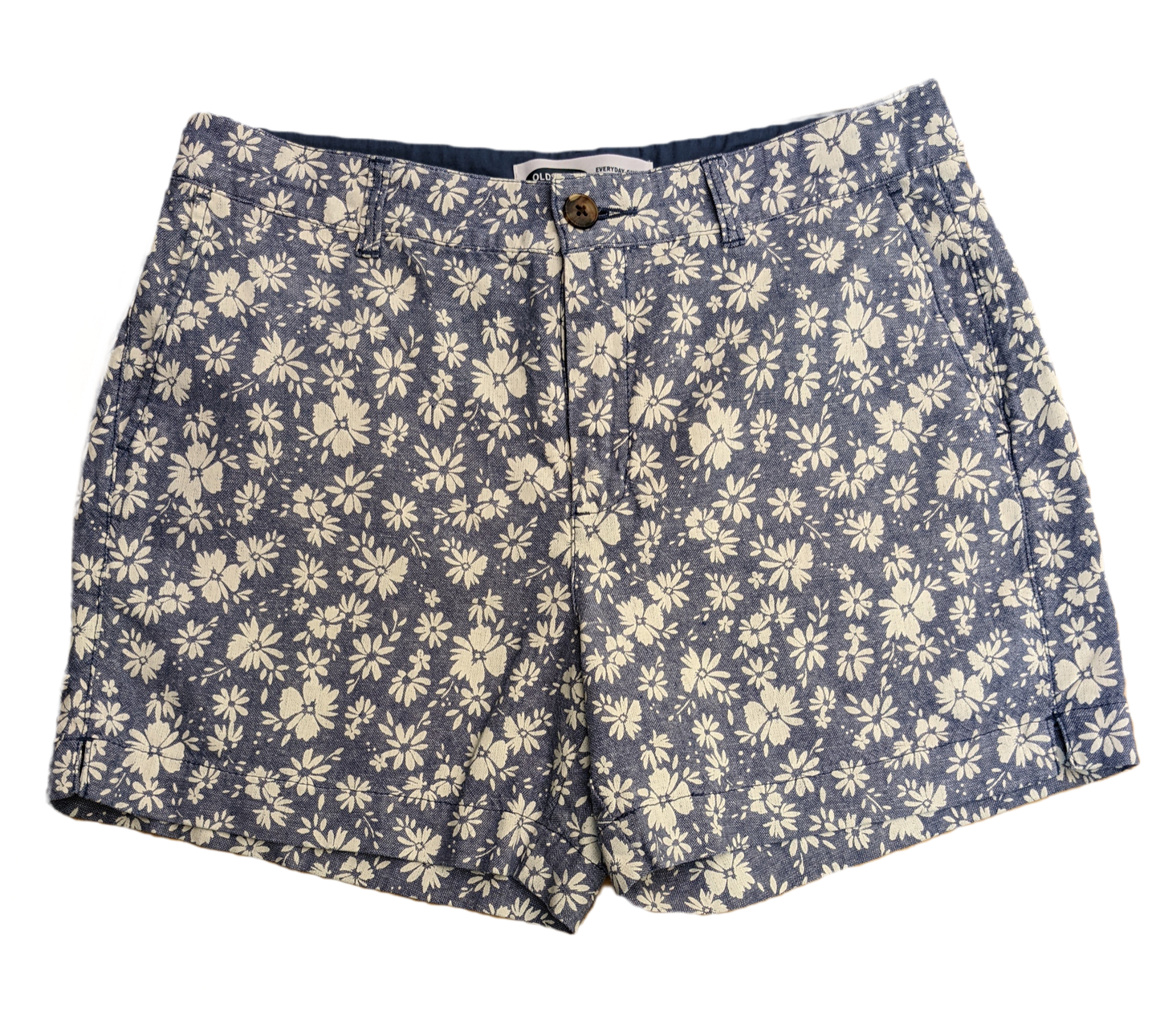 Old Navy High Rise Floral Print Shorts Old Navy high rise blue shorts with white floral print. Zip front with pockets in the front and back.