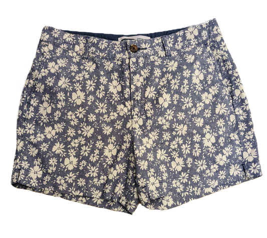 Old Navy High Rise Floral Print Shorts Old Navy high rise blue shorts with white floral print. Zip front with pockets in the front and back.