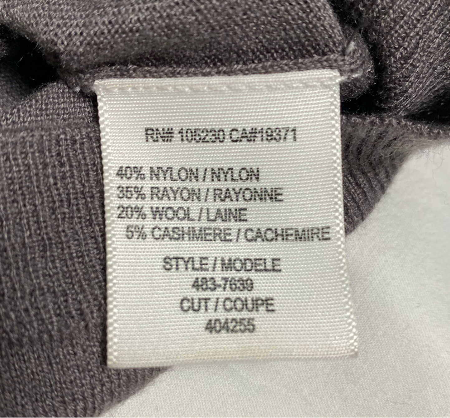 Jore Brown Knit Top sleeve a seamless fusion of professional elegance