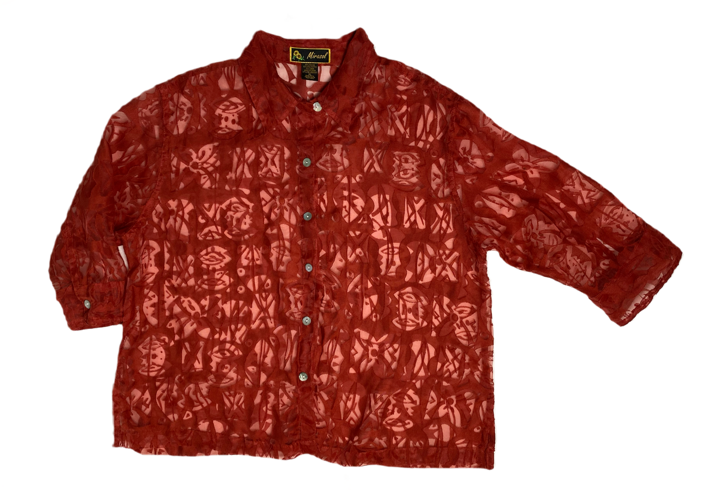 Mirasol Burn Out Blouse a dynamic embodiment of professional resilienc