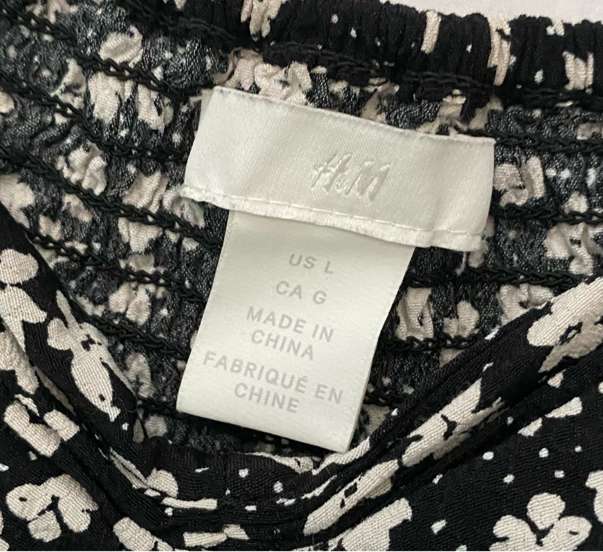 H&M Floral Print Short Sleeve Gathered Center Shirt H&M floral print short sleeve shirt with gathered front center and elastic back.