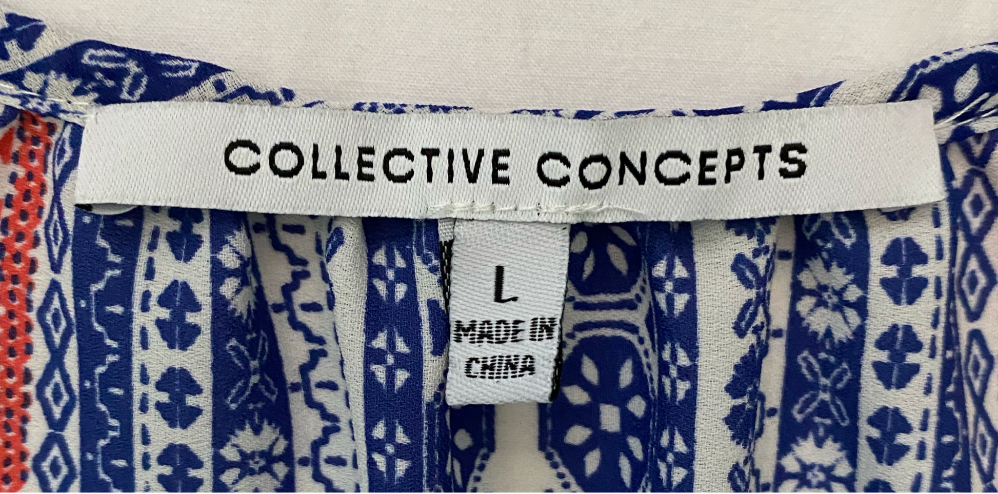 Collective Concepts Sleeveless Print Blouse Size L Experience the perfect blend of style and comfort with our Collective Concepts Sleeveless Print Blouse! Featuring