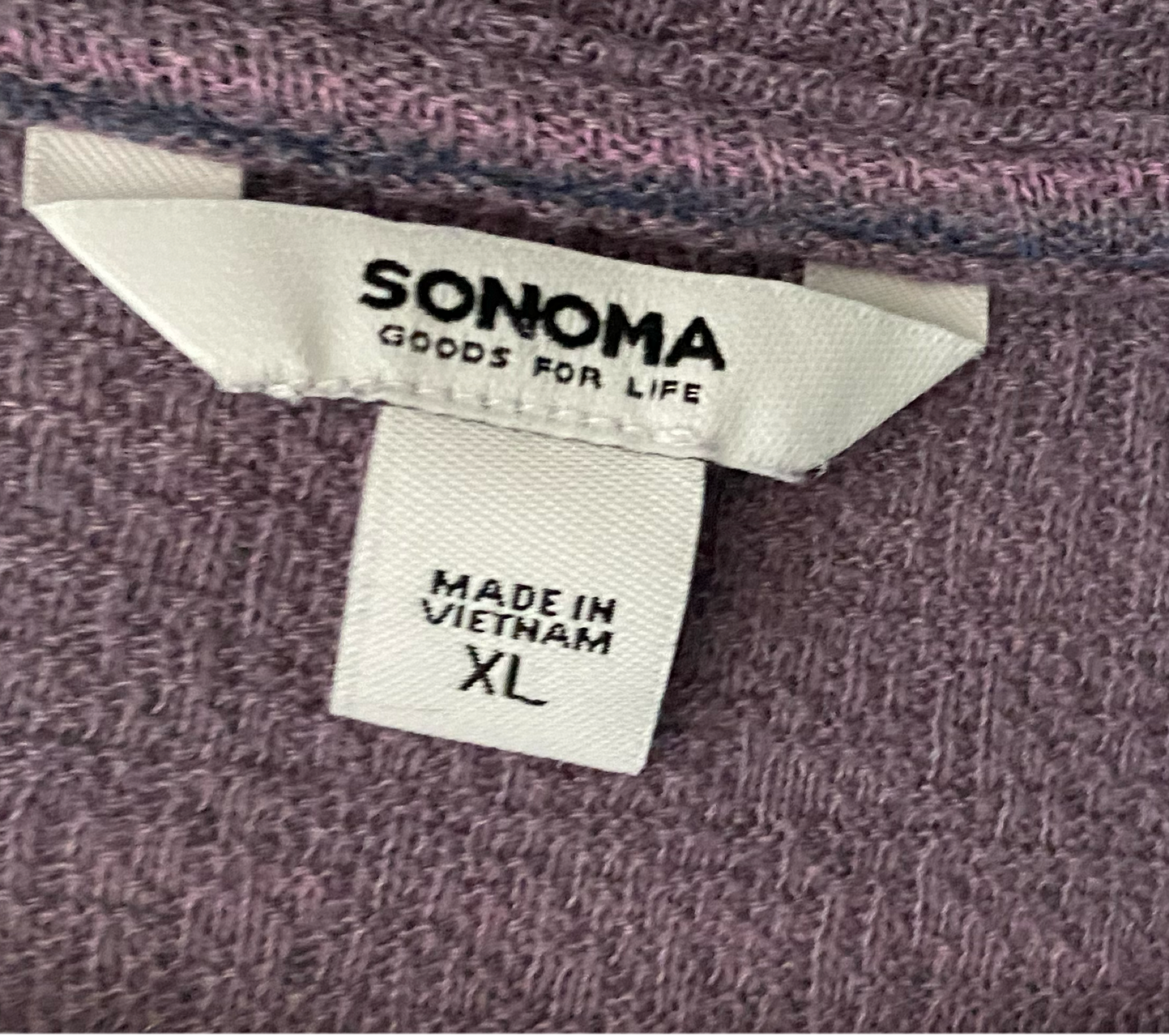 Sonoma Three Quarter Sleeve Striped Tie Front Top Spice up your wardrobe with the Sonoma Tie Front Top! This playful and stylish top features plum stripes and a tie