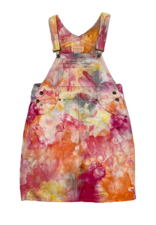 REFRESHED - Squeeze Canvas Skirt Overalls  Get ready to squeeze into style with our REFRESHED Squeeze Canvas Skirt Overalls. Hand dyed with a bright and playful mix