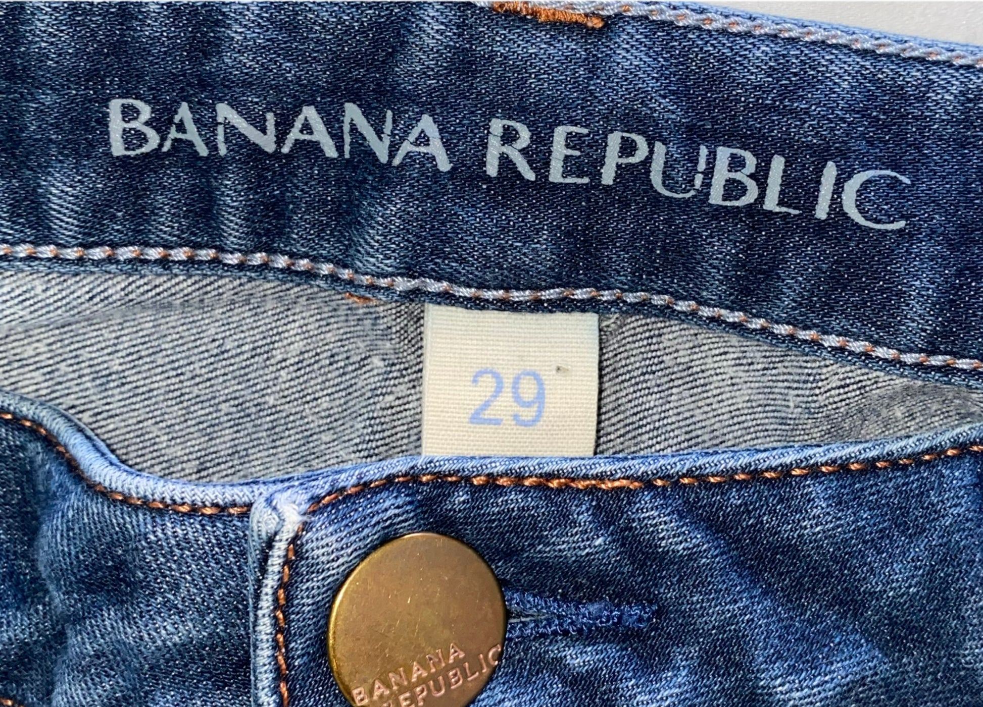 Banana Republic Faded Dark Wash Skinny Jeans  Elevate your denim game with our Banana Republic Skinny Jeans. Crafted with a faded dark wash and a size 29 fit, these