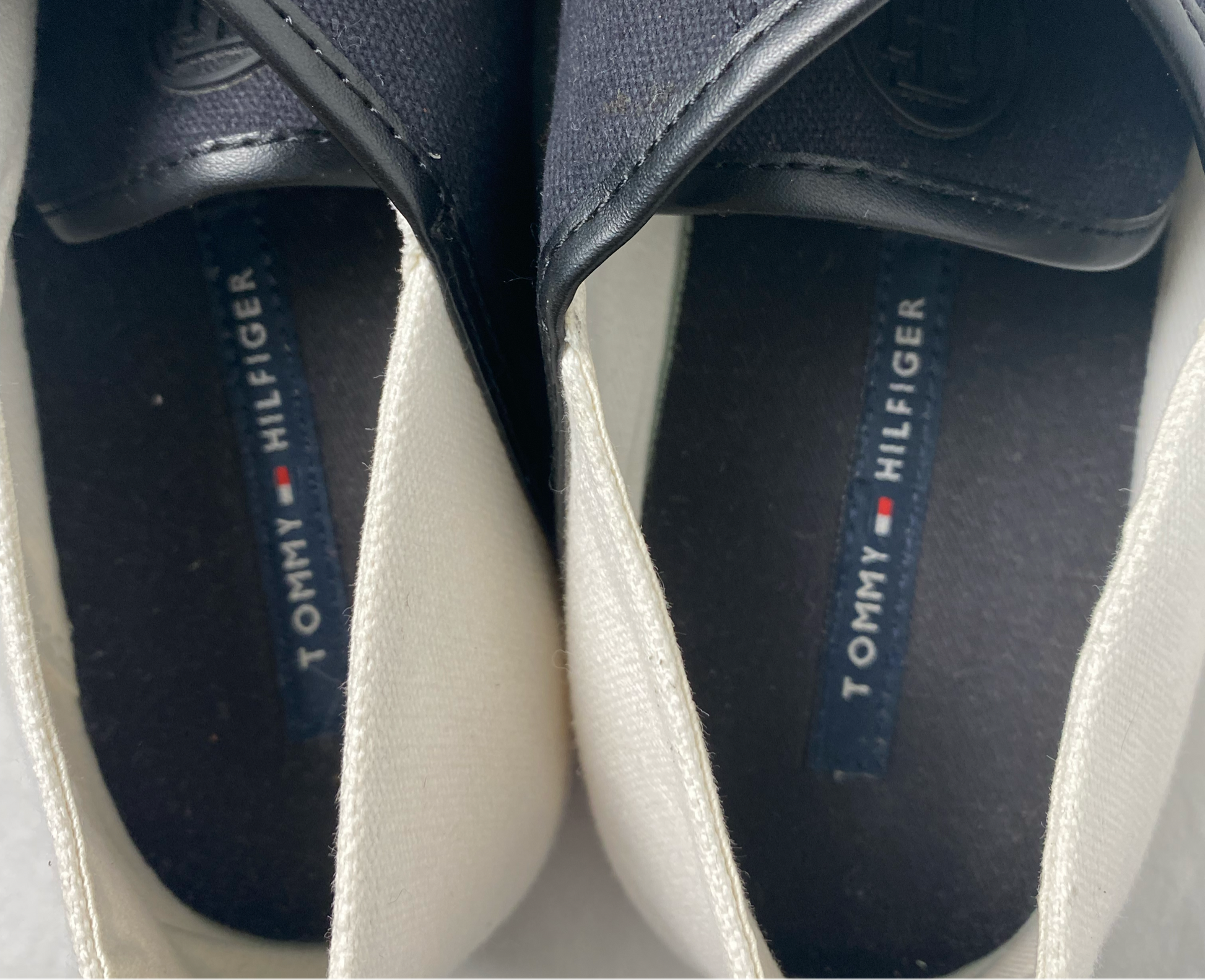 Tommy Hilfiger Black and White SneakersTommy Hilfiger black and white canvas lace up sneakers.