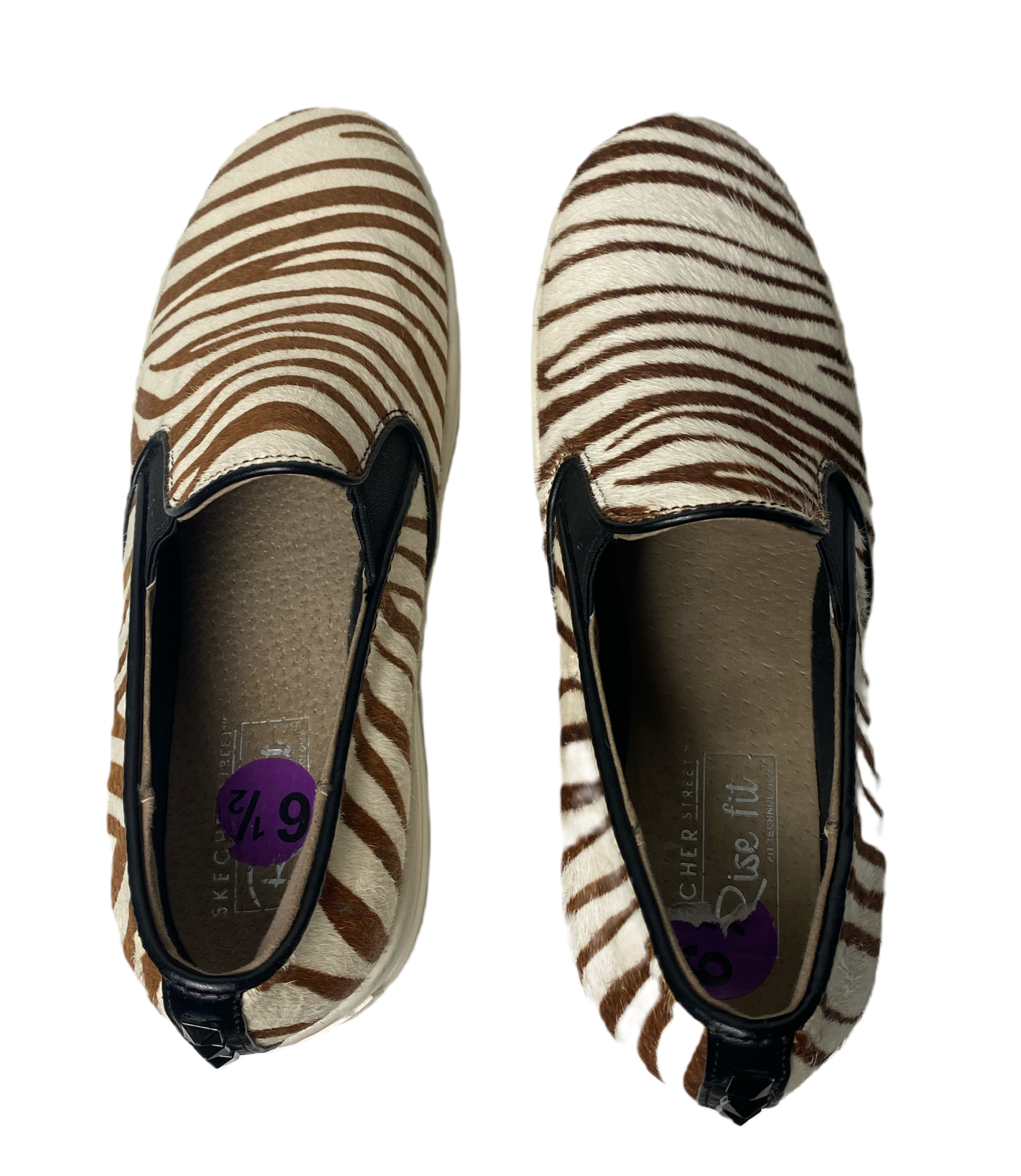 Sketchers Street Rise Fit Zebra Stripe Sneakers Get ready to roar with these Sketchers Street Rise Fit Zebra Stripe Sneakers! With their playful zebra print and perf