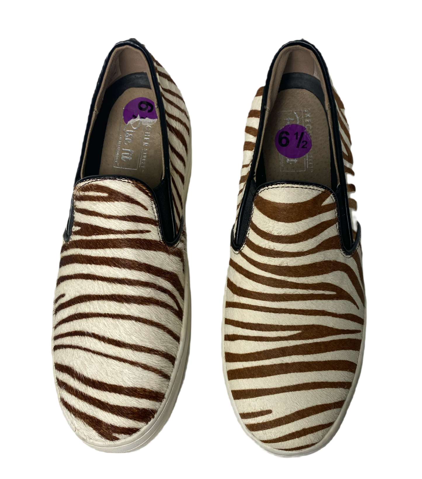 Sketchers Street Rise Fit Zebra Stripe Sneakers Get ready to roar with these Sketchers Street Rise Fit Zebra Stripe Sneakers! With their playful zebra print and perf