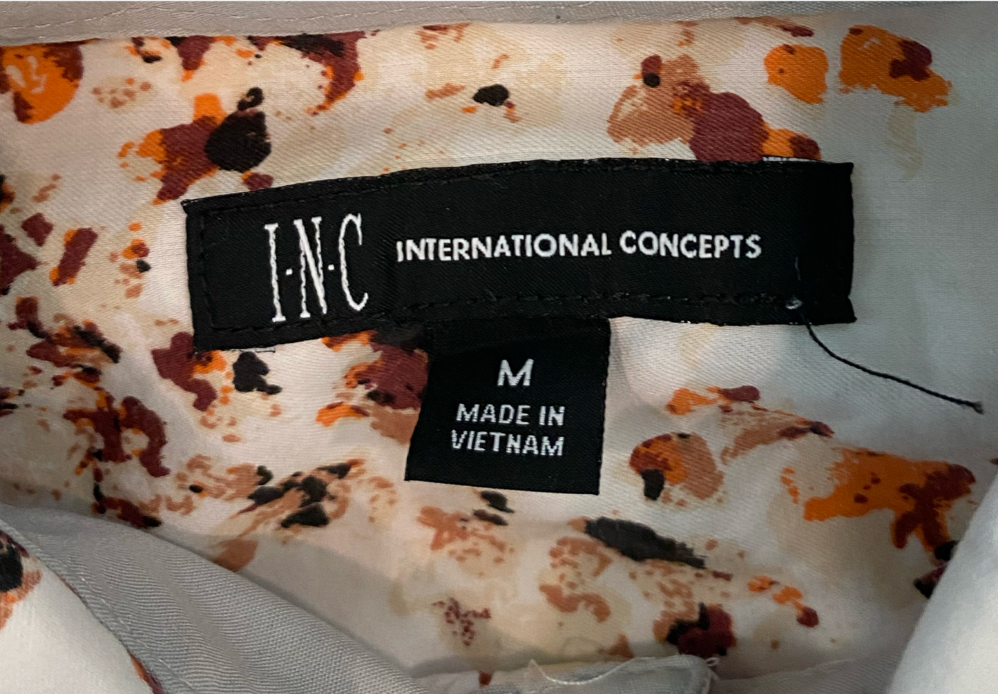 INC Abstract Print Button-up Long Sleeve Blouse  Turn heads with this stunning INC Abstract Print Button-up Long Sleeve Blouse! The abstract print adds a bold touch,