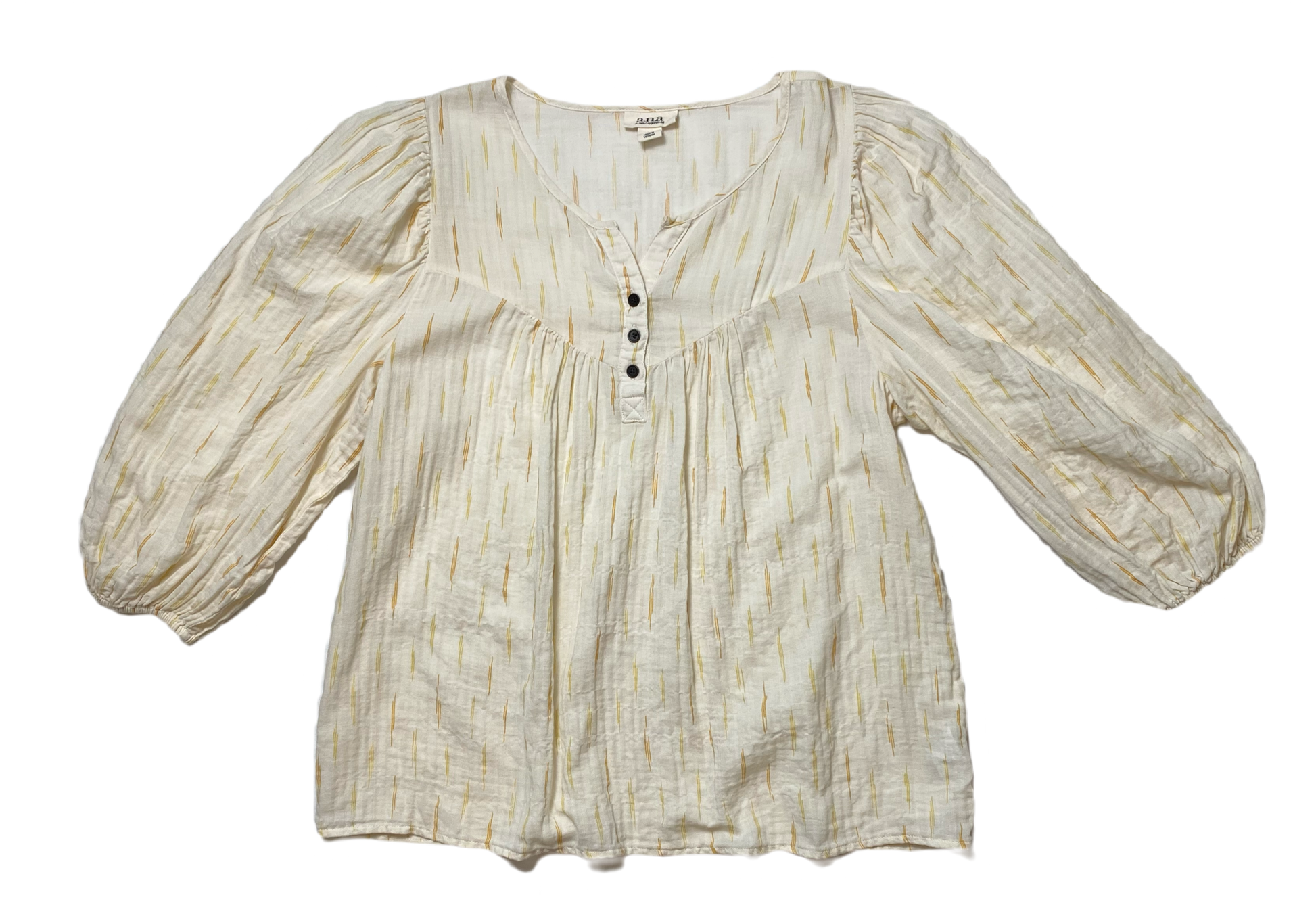 ana Cream Peasant Style 3/4 Sleeve Print Blouse Add a touch of bohemian charm to your wardrobe with a.n.a.'s Cream Peasant Style Blouse. Featuring a subtle tan pr