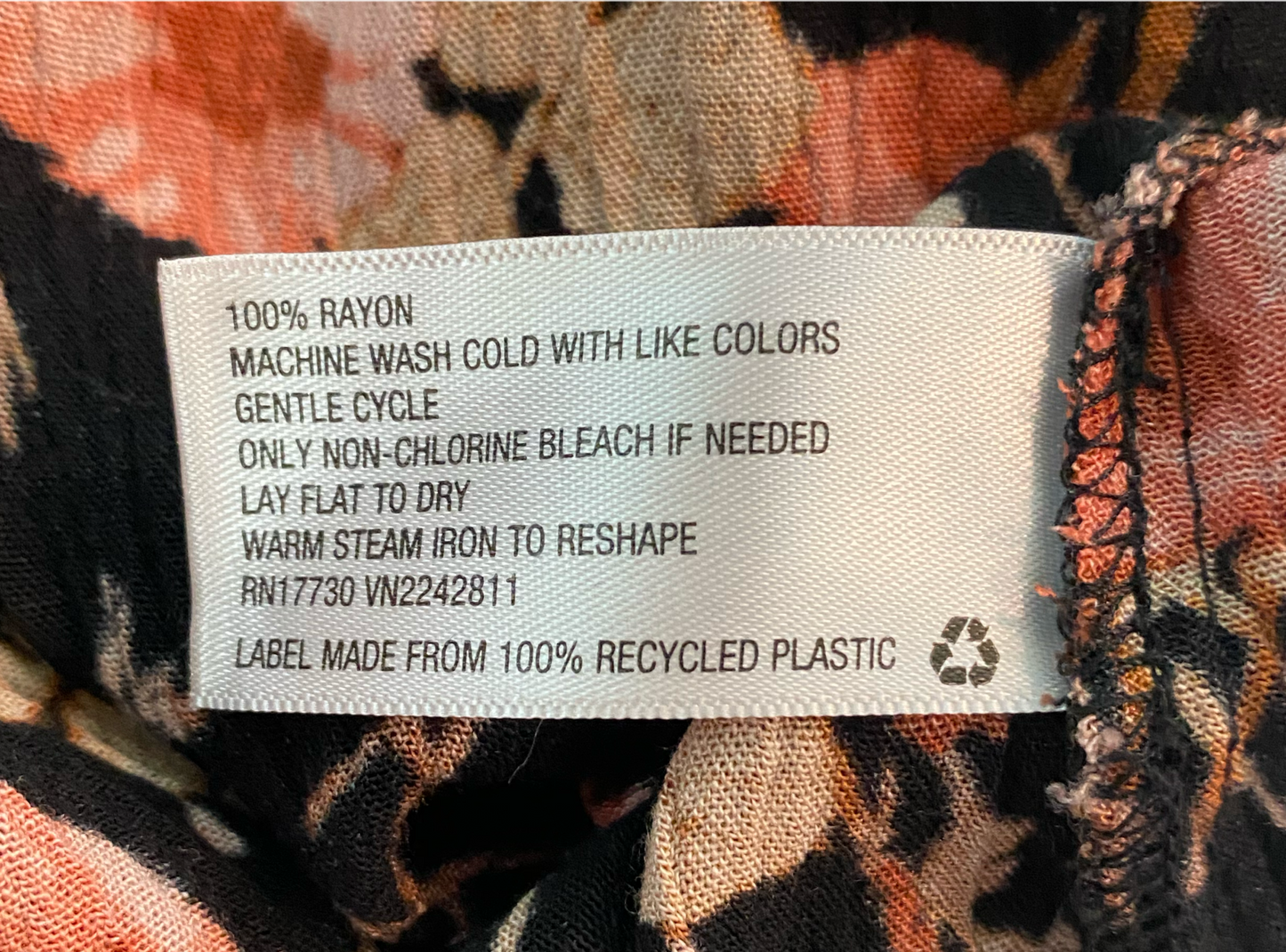 Mossimo Black Floral Print BlouseMossimo Supply Co black floral print top with hater type neck and cold shoulder sleeves.
Pair this with denim shorts and black sandals for a beach day with friends!