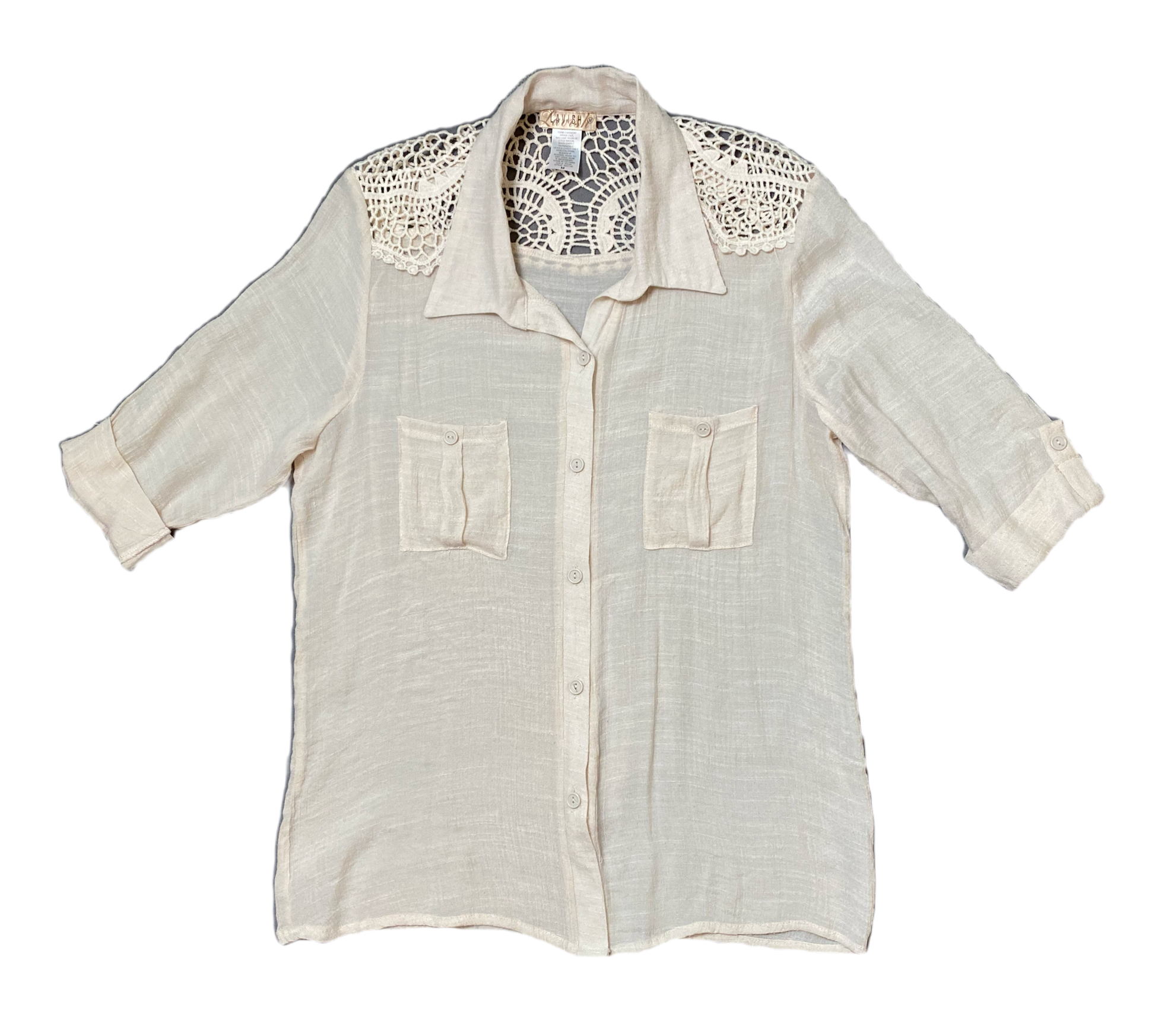 Lavish Cream Blouse with Crochet Accent.Lavish Cream button front blouse with crochet accent. Roll up sleeves and front pockets.