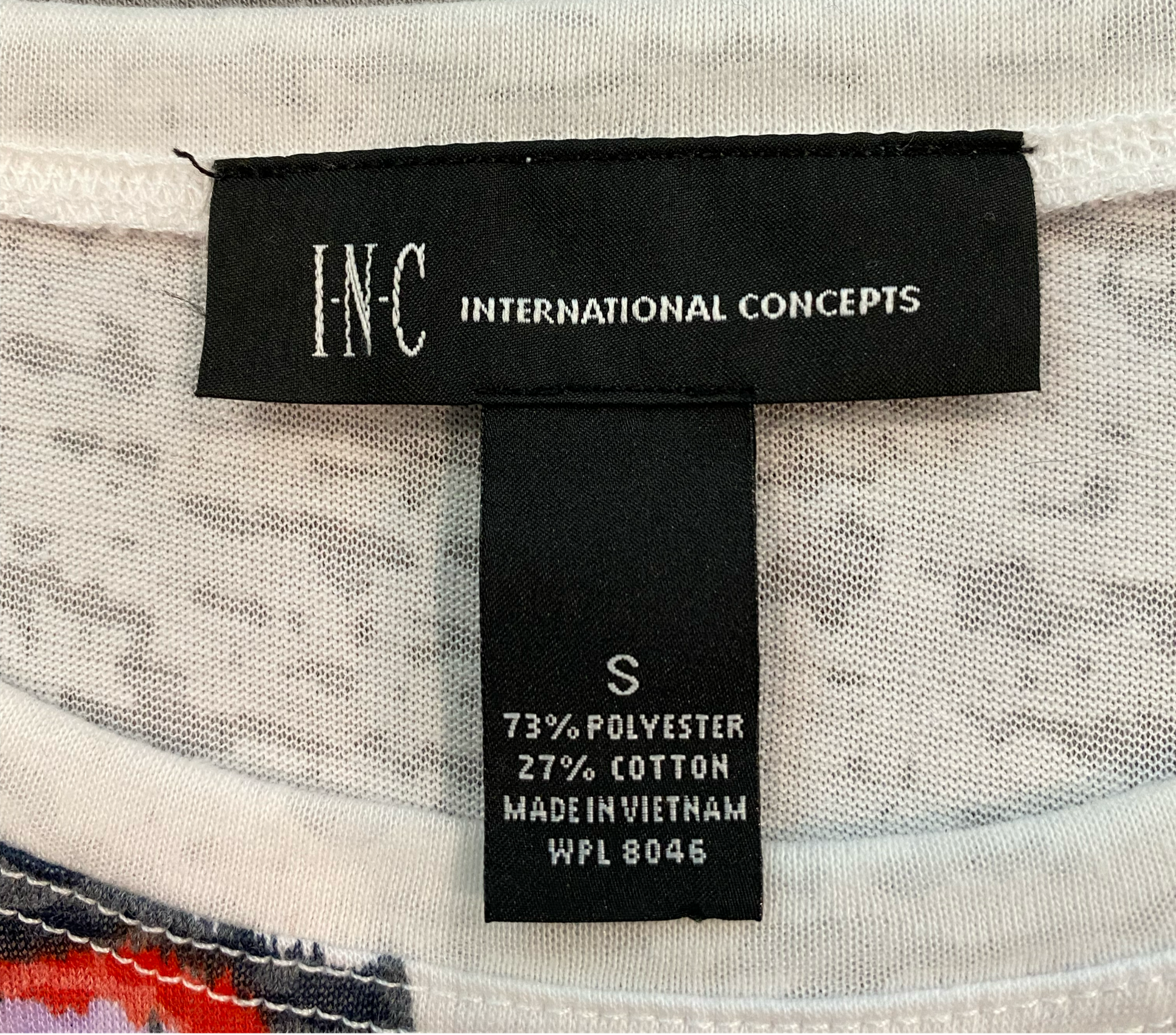 INC White Top with Graphic INC white burn out t-shirt top with paisley print on front and one sleeve.