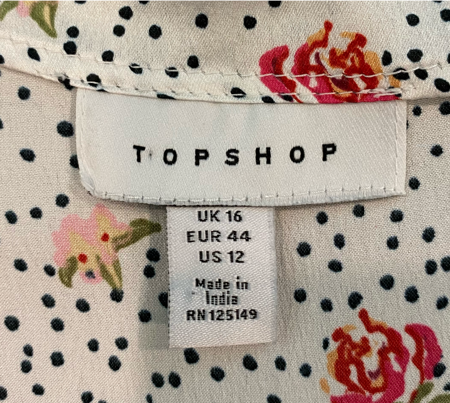 Topshop White Printed Silky BlouseTopshop long full sleeve silky printed blouse with button front and tie at elastic band waist.